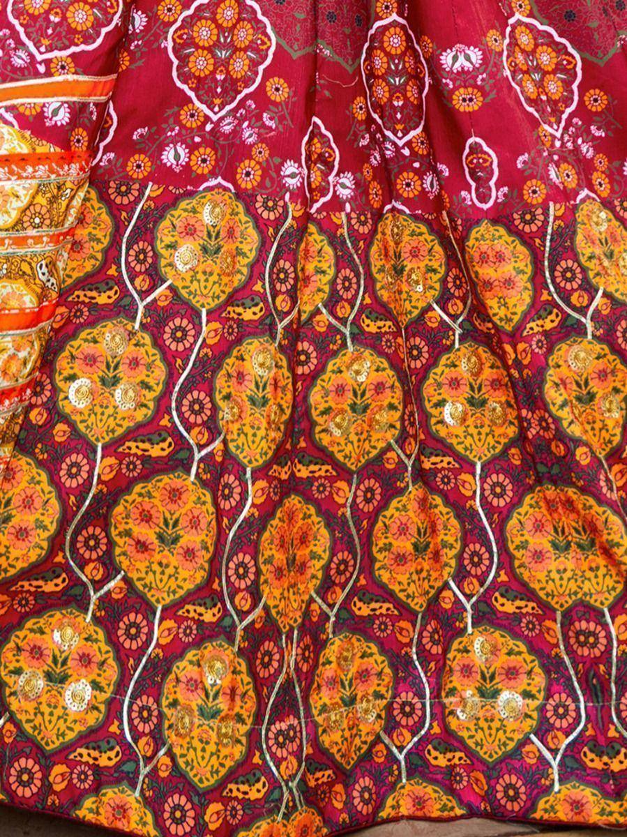 Vibrant red and gold floral printed lehenga skirt with intricate embroidery, perfect for Indian ethnic wear.