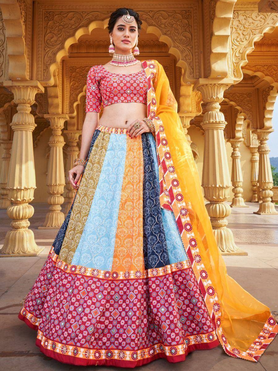 Colorful Indian lehenga choli with patchwork skirt and yellow dupatta, perfect for weddings and festivals