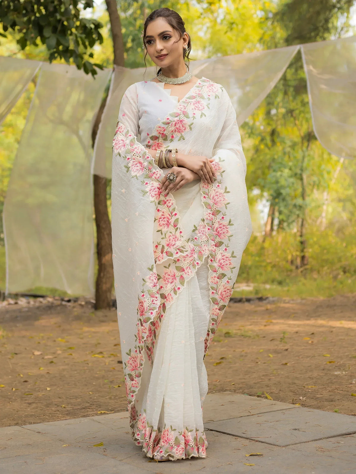 White floral embroidered saree with pink roses, perfect for Indian ethnic wear occasions