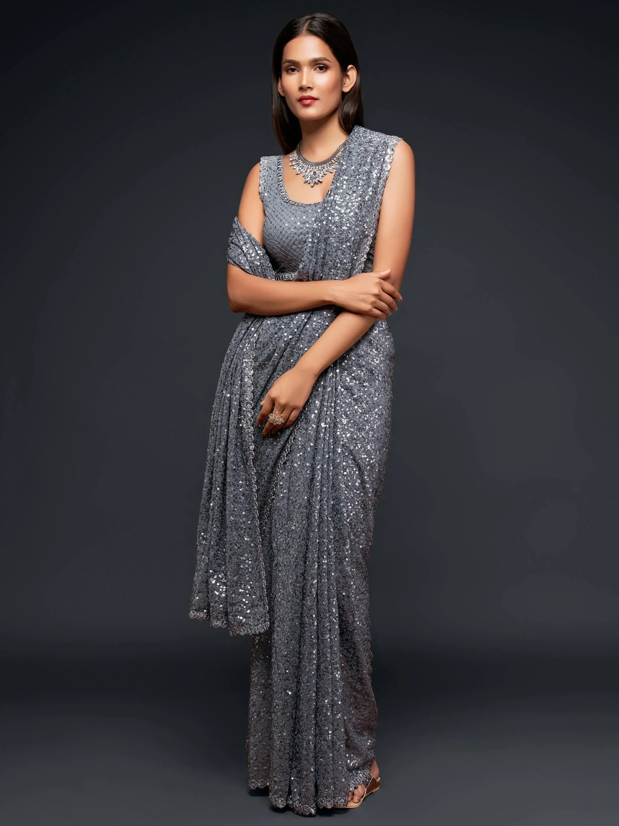 Grey sequin ethnic gown with cold shoulder design, perfect for Indian festive occasions and parties.