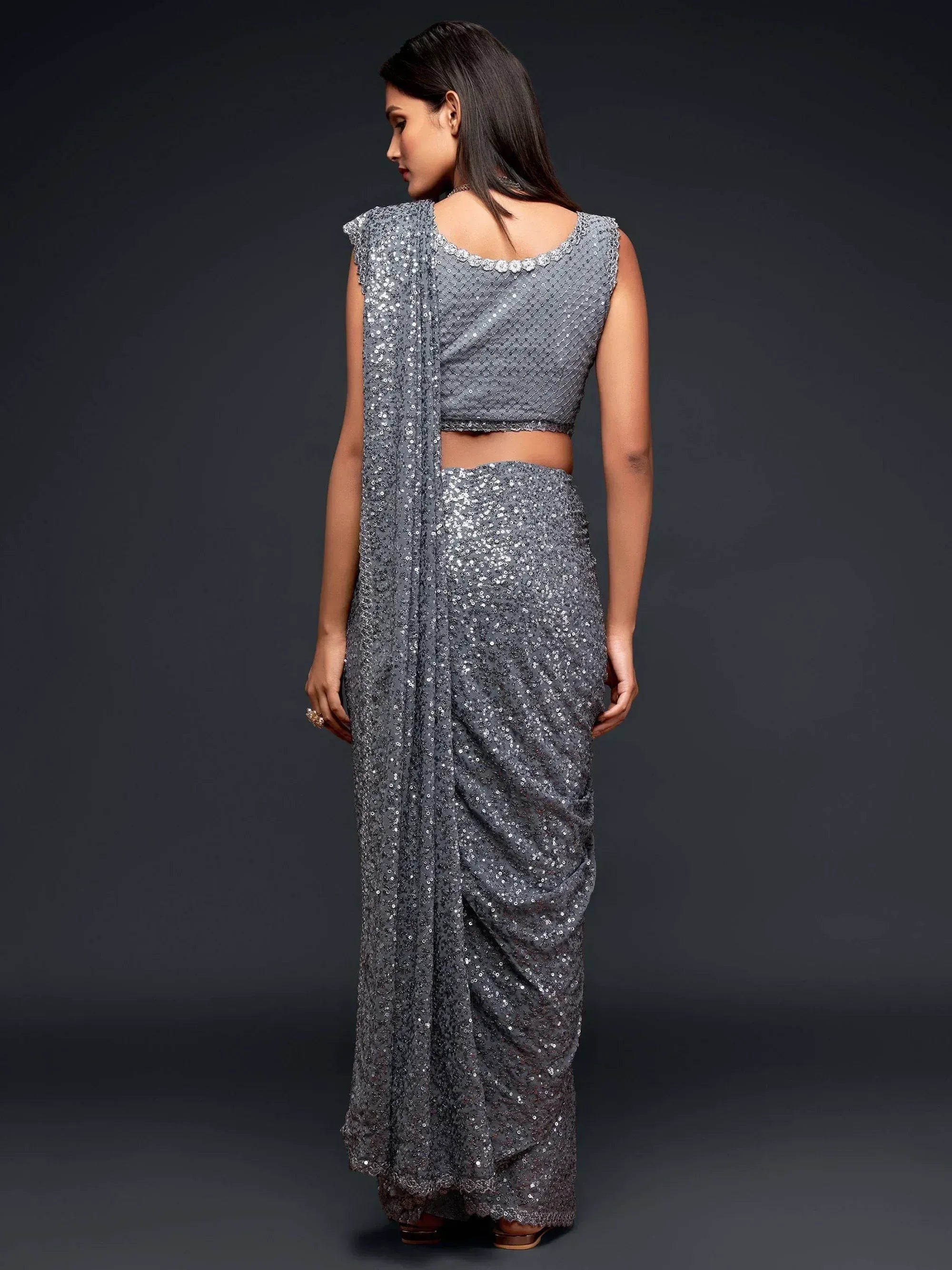 Grey sequin saree with sleeveless blouse, elegant Indian ethnic wear for parties