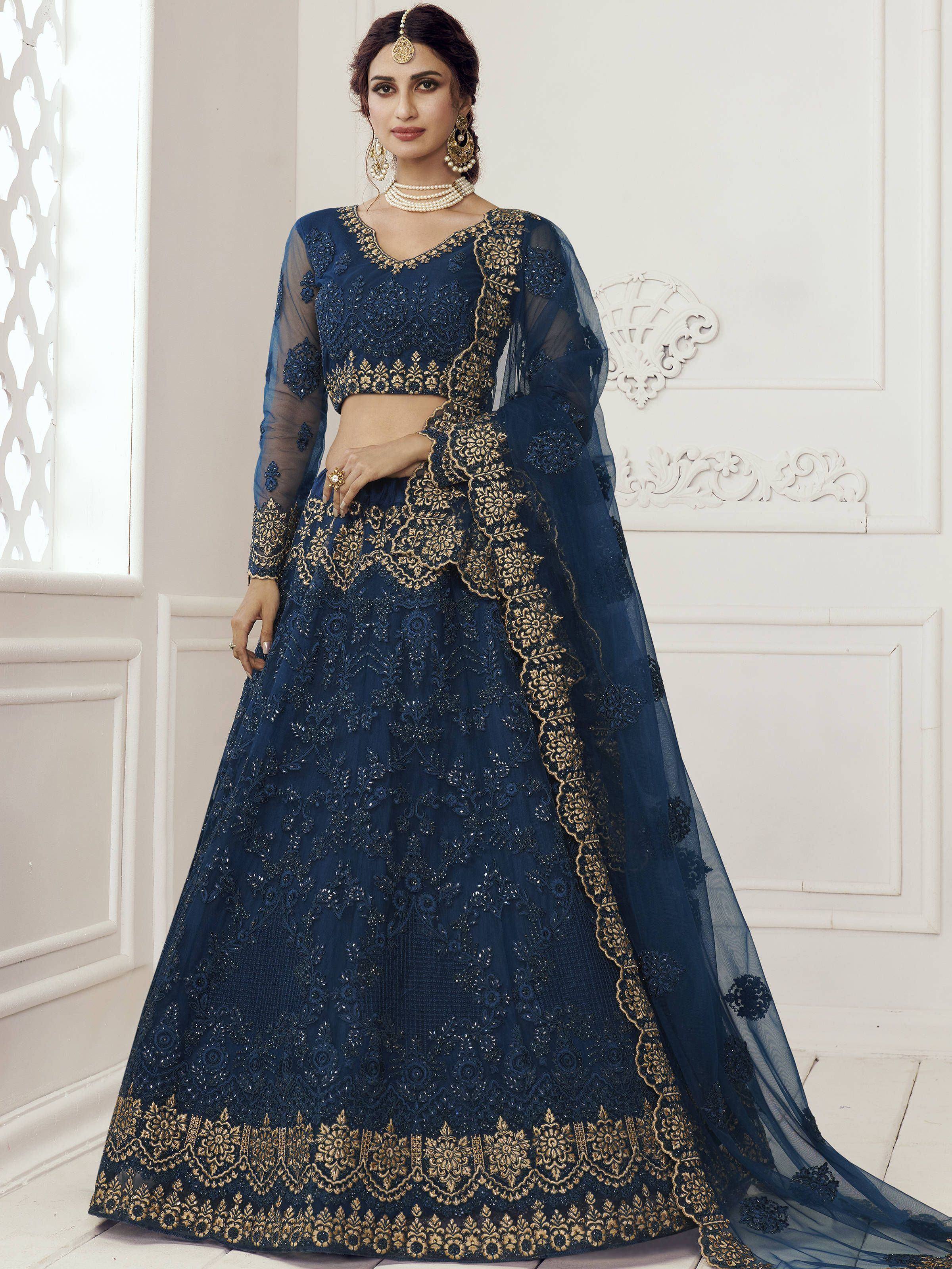 Navy blue designer lehenga choli with gold embroidery, perfect for Indian weddings and festive occasions.