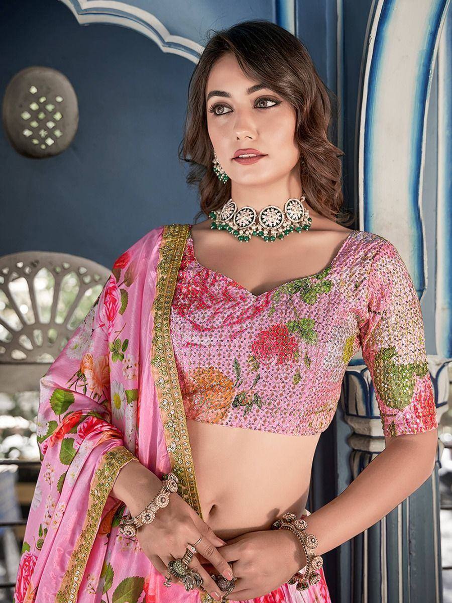 Pink floral lehenga choli with sequin blouse and green jewelry, ethnic Indian wear