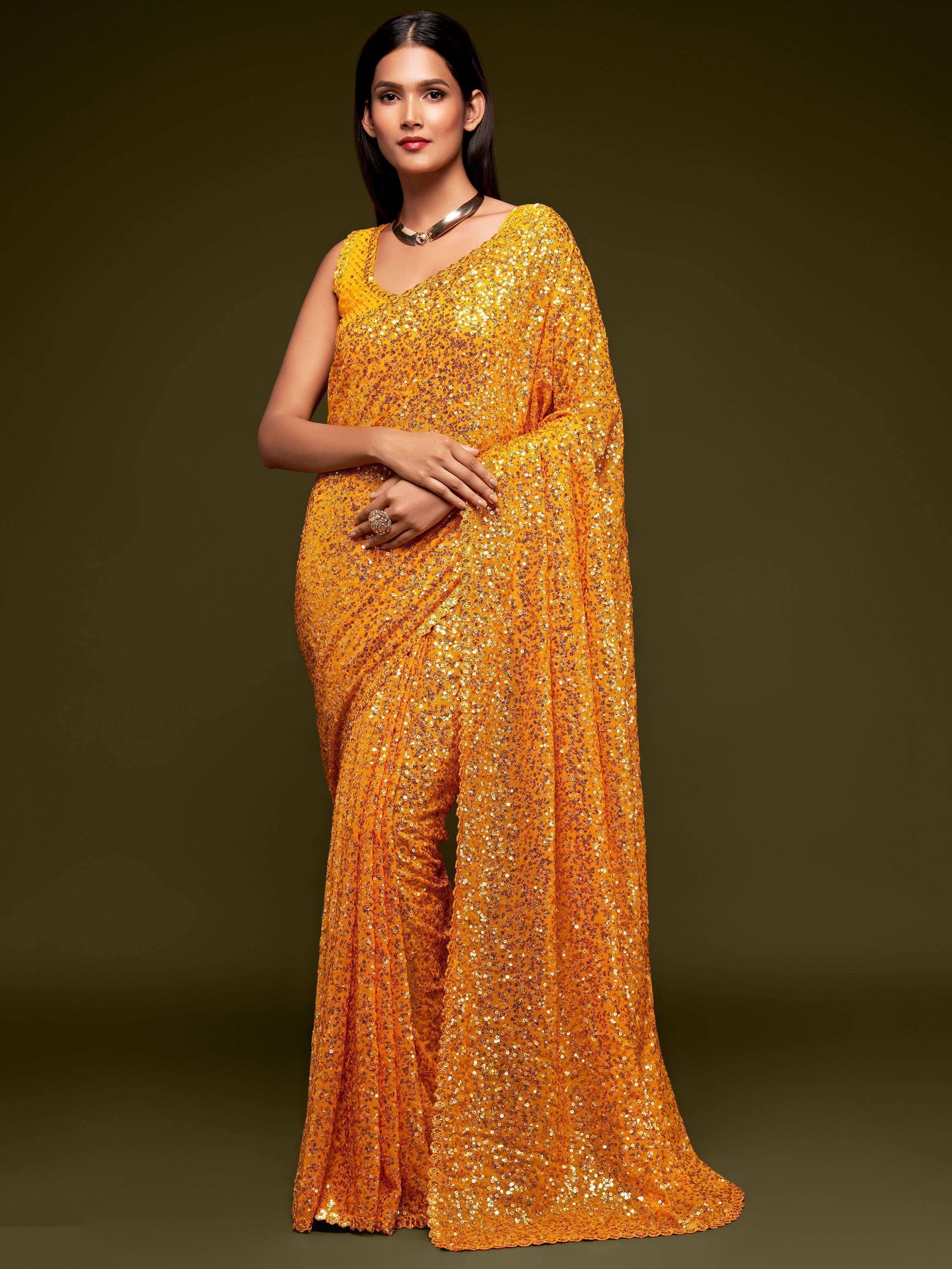 Golden sequin saree with V-neck blouse, ethnic Indian wear for festive occasions