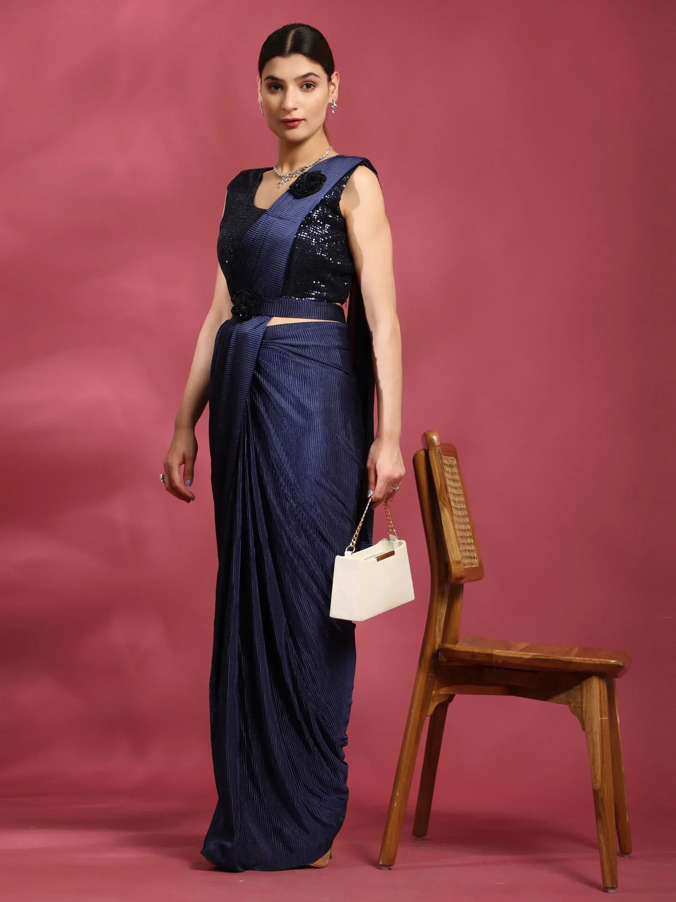 Navy blue pleated saree with sequin blouse, perfect for Indian ethnic wear occasions