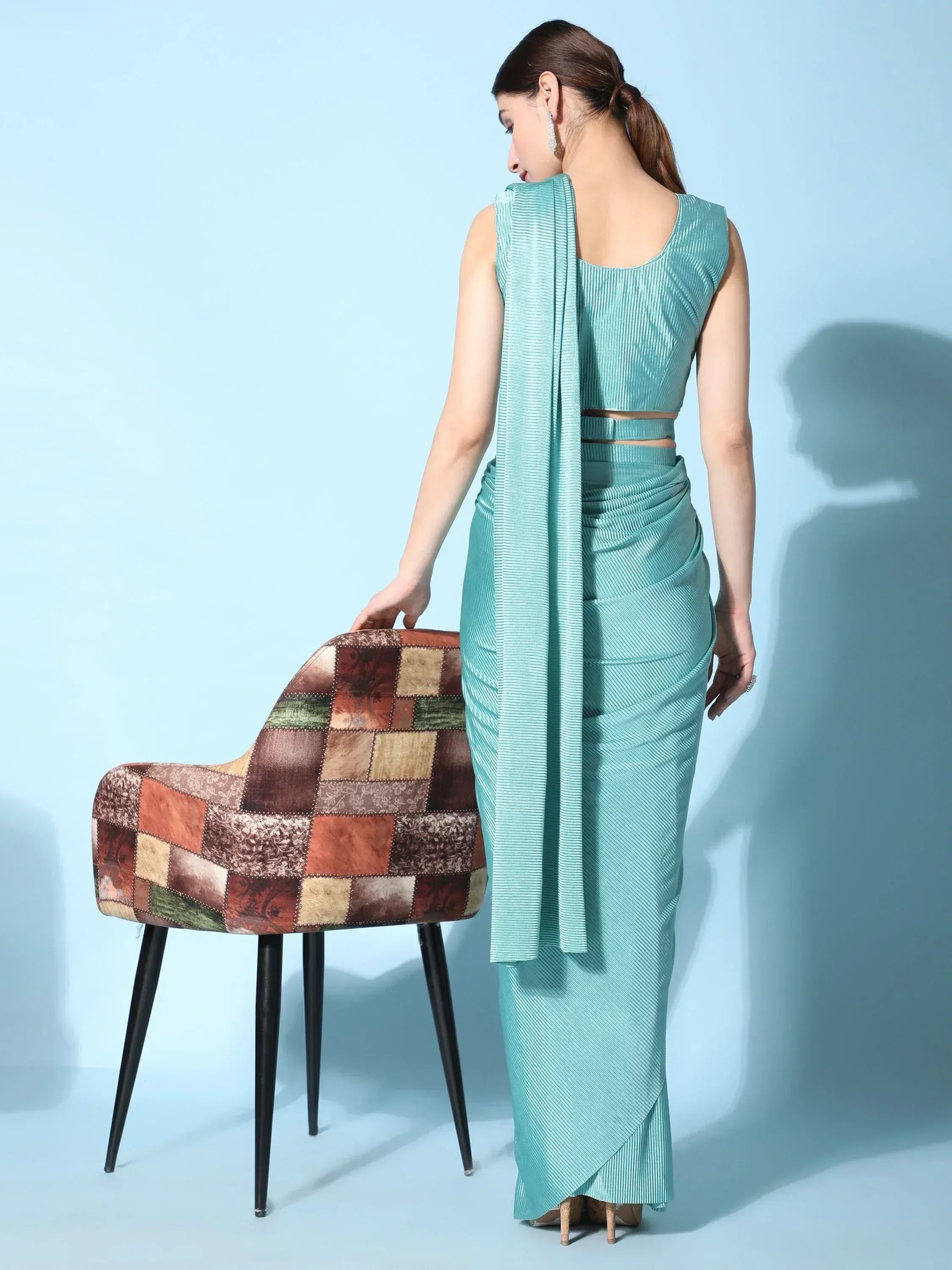 Teal pleated saree with modern blouse, stylish ethnic wear for women