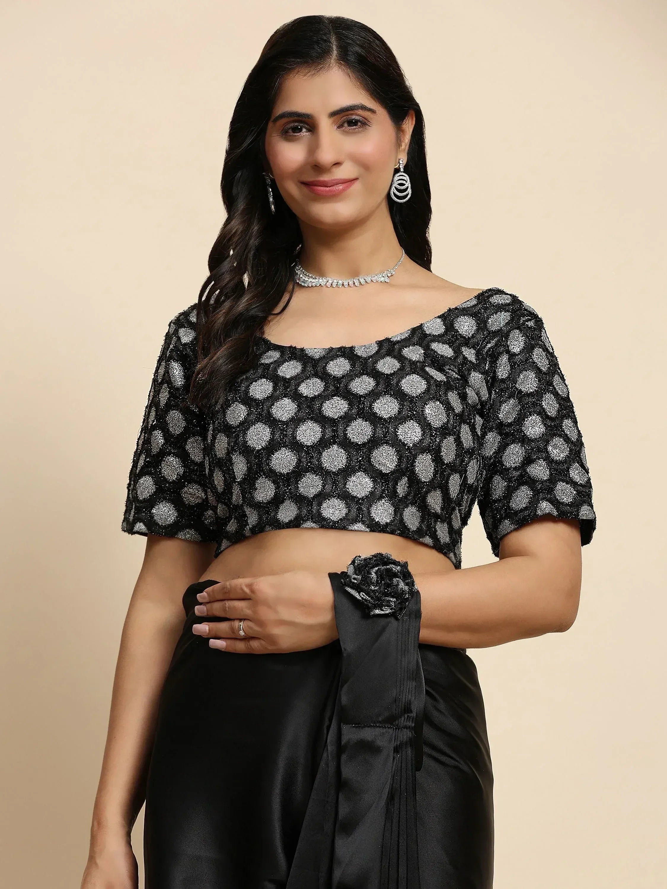 Black polka dot blouse with silver shimmer, paired with black saree, perfect for Indian ethnic wear