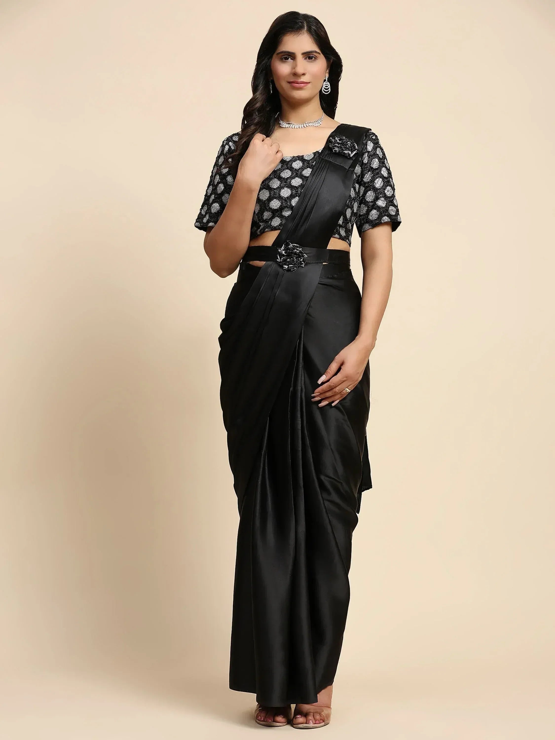 Black satin saree with polka dot blouse, perfect for Indian ethnic wear and designer occasions.
