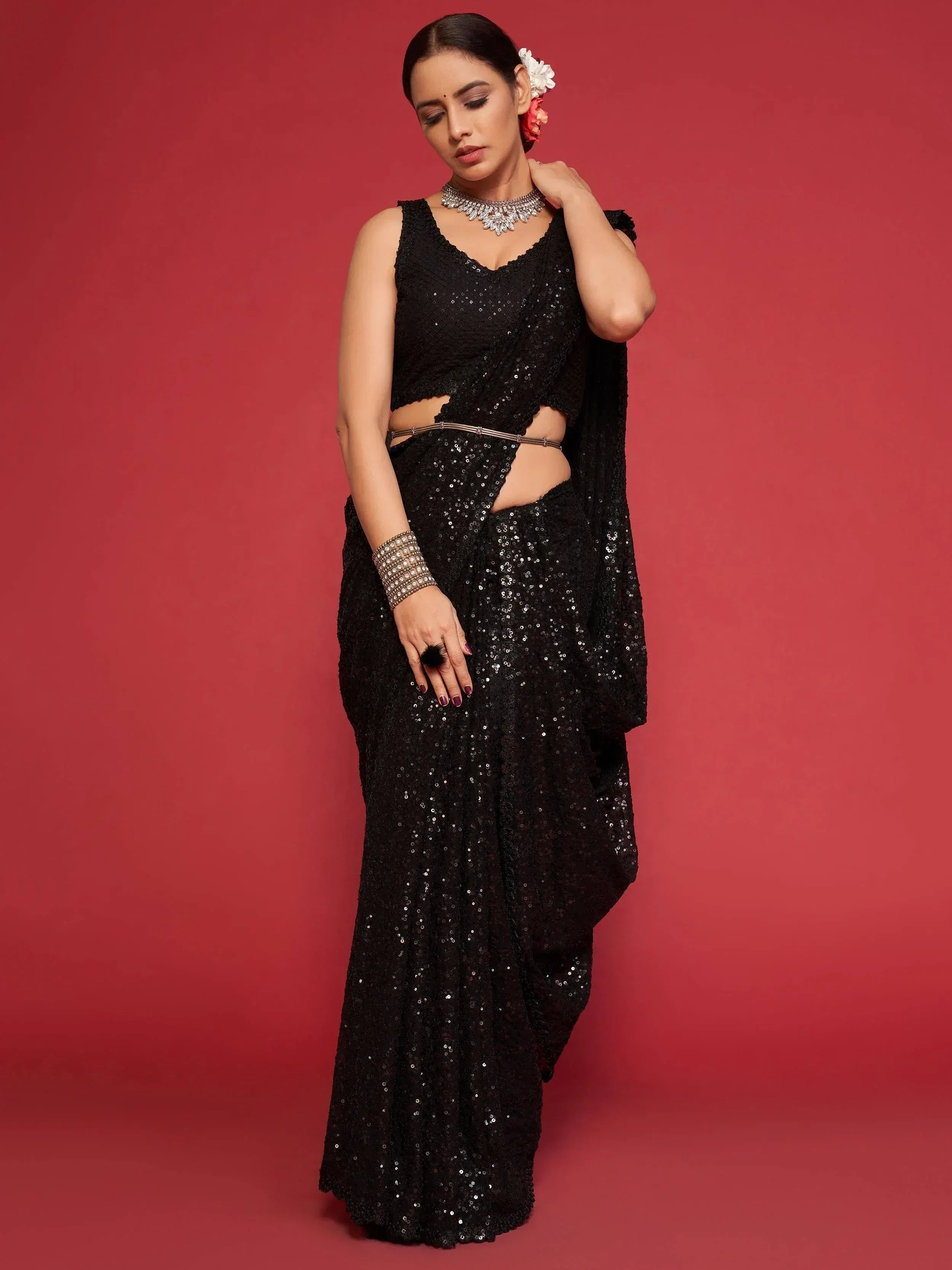 Black sequin saree with cut-out blouse, perfect for Indian ethnic wear events