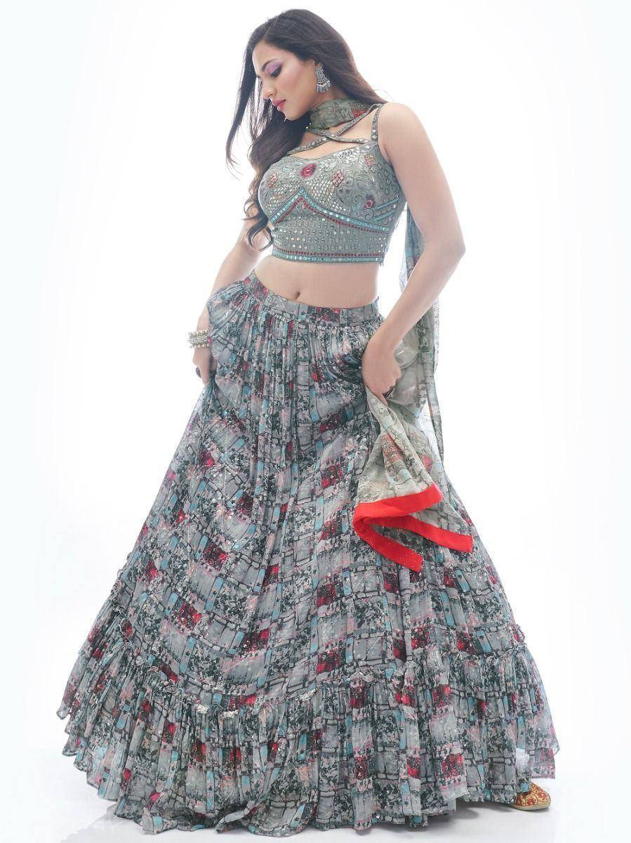 Designer lehenga choli with printed skirt and embellished blouse, perfect for Indian ethnic wear occasions