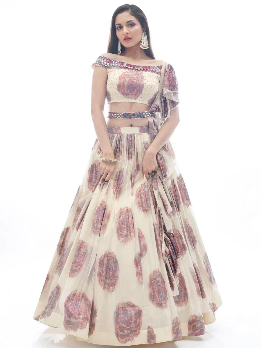 Off-shoulder floral lehenga choli with embroidered blouse and sheer dupatta, perfect for Indian ethnic occasions