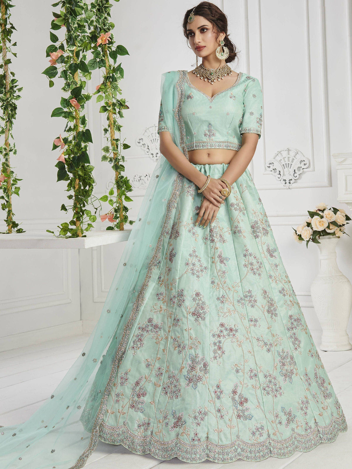 Mint green designer lehenga choli with floral embroidery, perfect for weddings and ethnic events