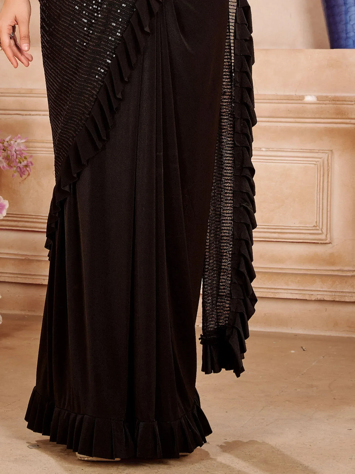 Black ethnic gown with sequins and ruffles, perfect for Indian occasions