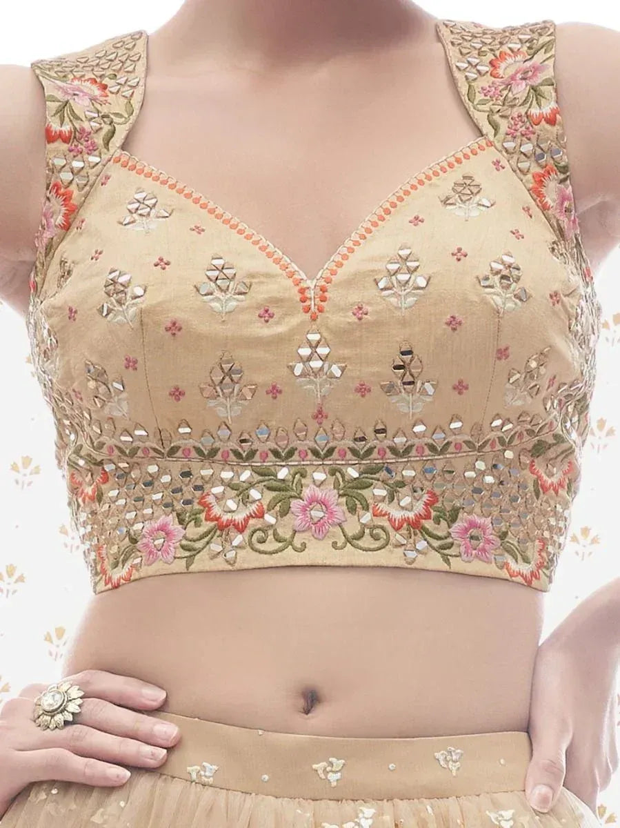 Beige floral embroidered lehenga choli blouse with mirror work and V-neck design