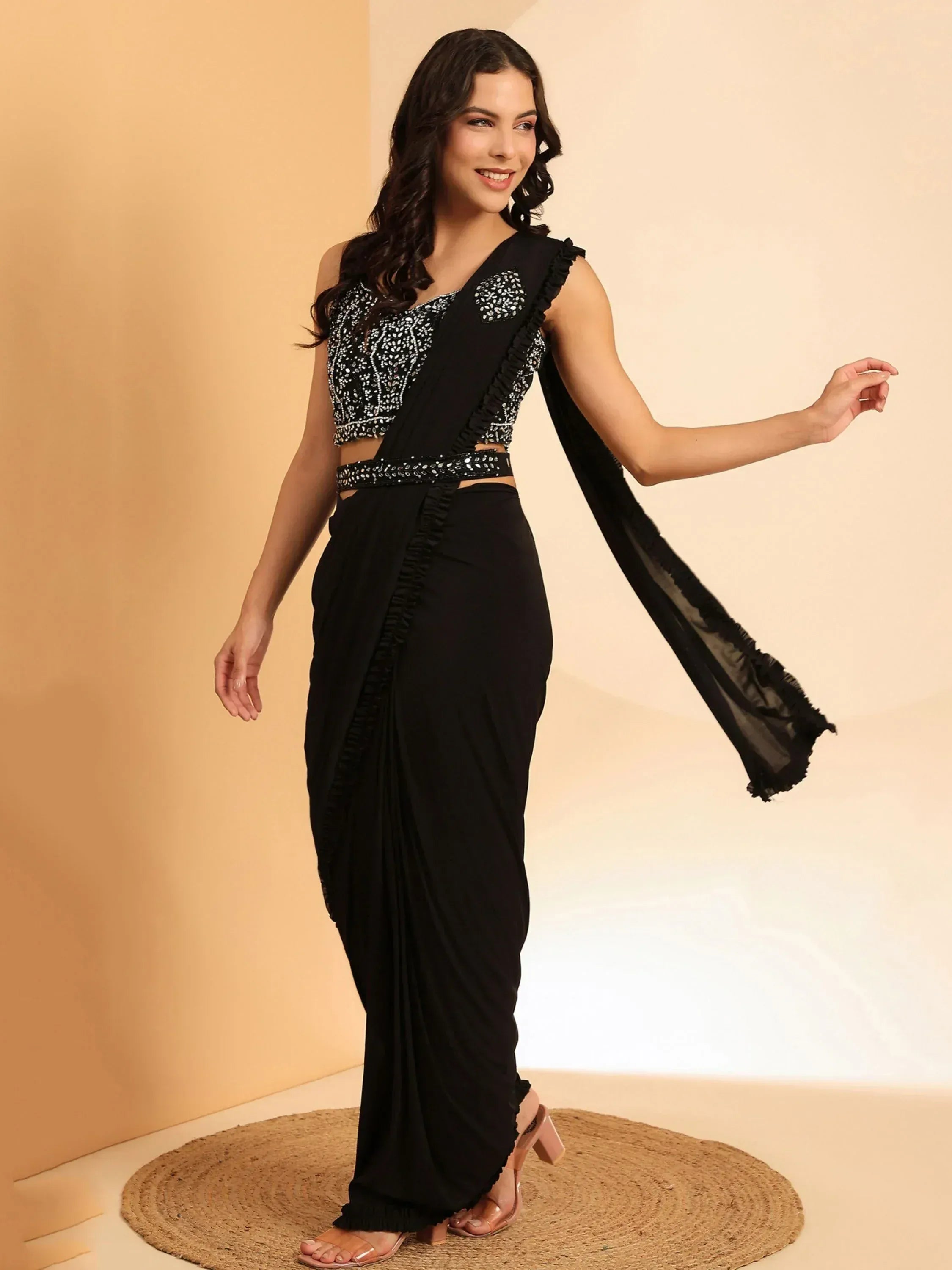 Black embroidered saree gown with ruffles and belt, stylish Indian ethnic wear for women