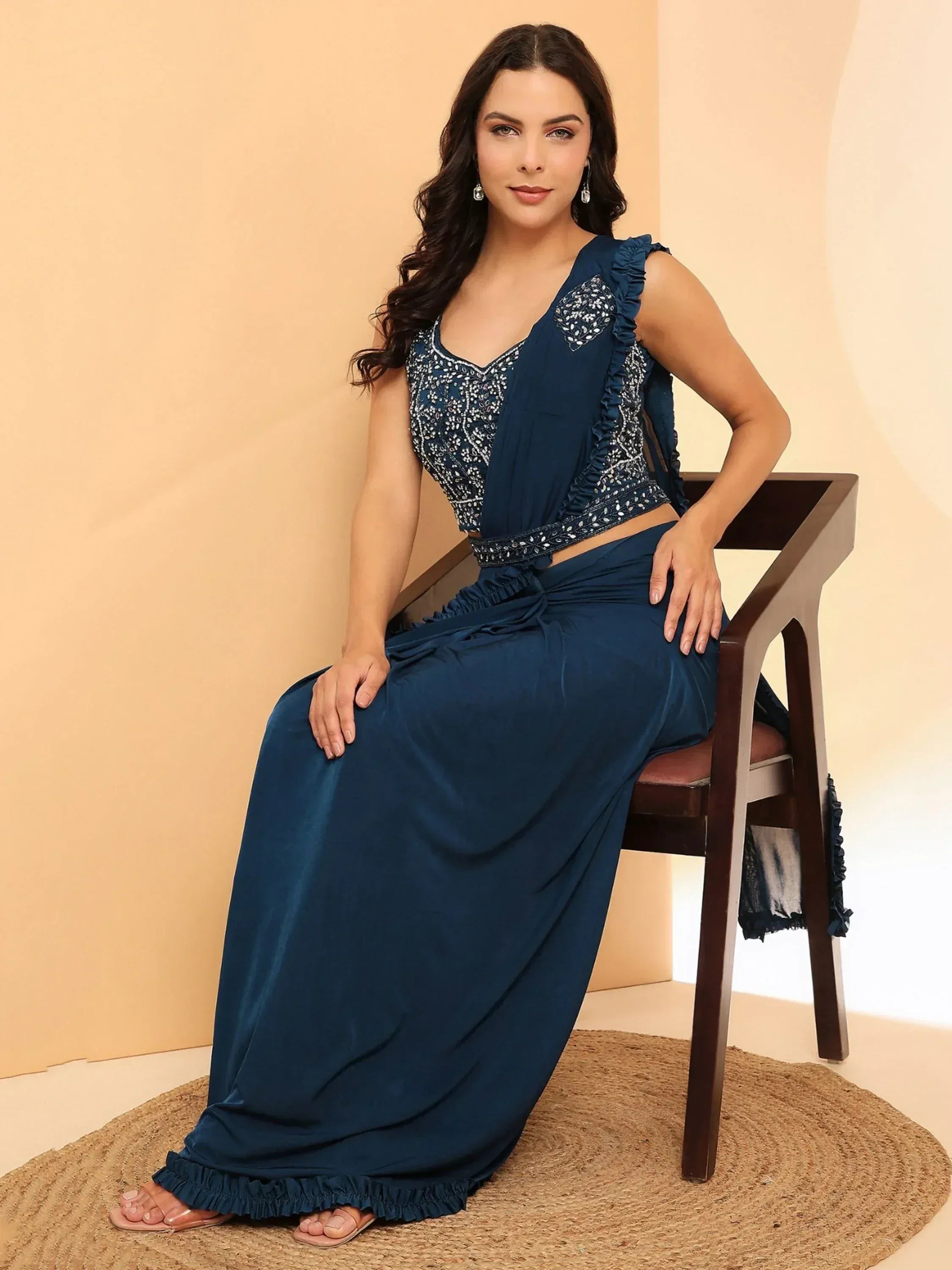 Navy blue ethnic gown with embroidery and ruffles, perfect for Indian occasions