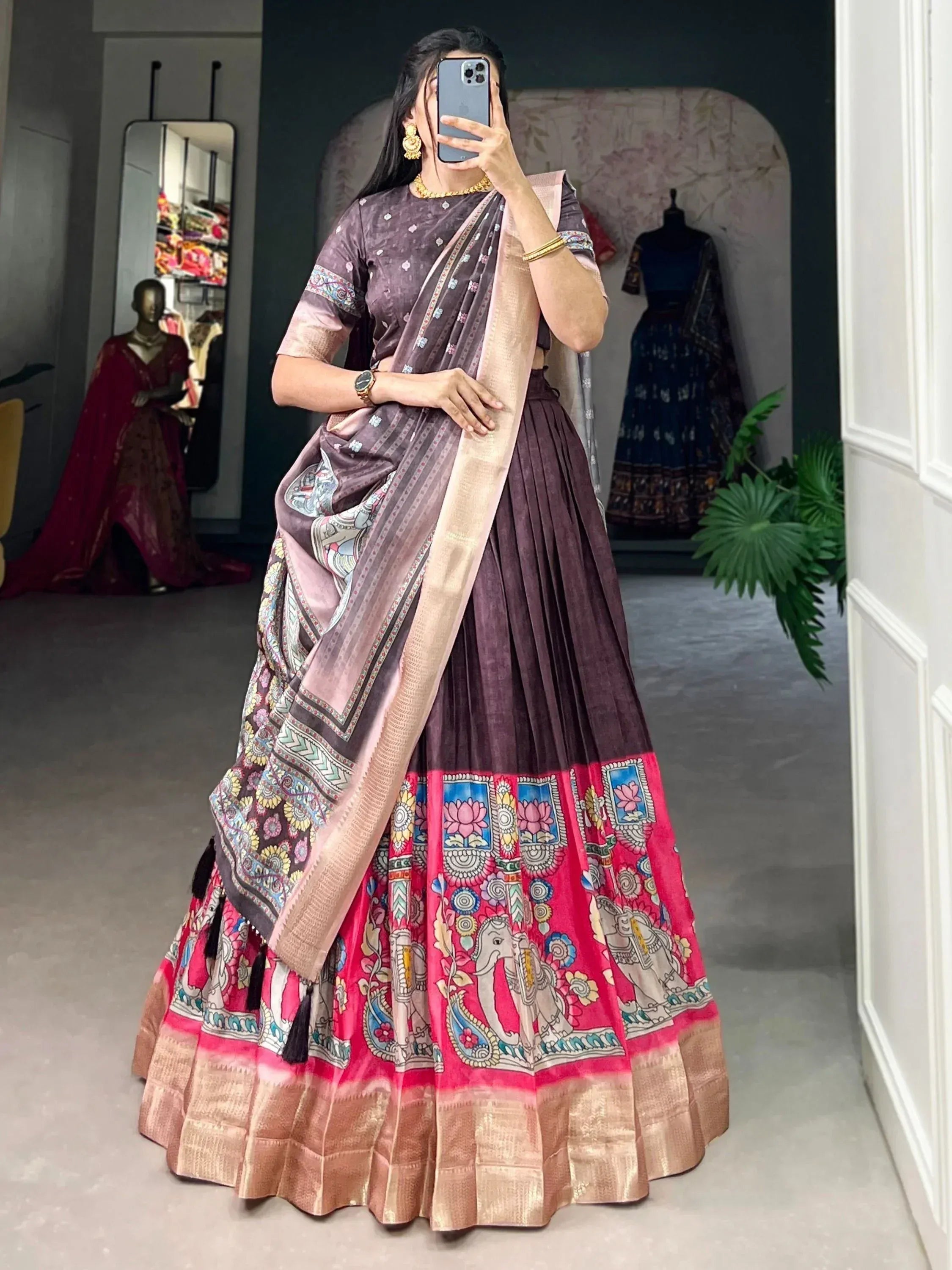Elegant Indian ethnic lehenga choli with vibrant floral and elephant prints, perfect for festive occasions.