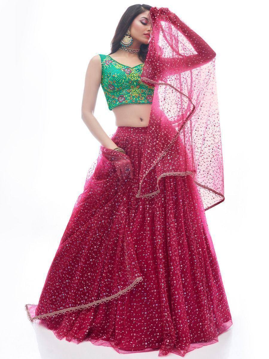 Green embroidered blouse with maroon sequin lehenga choli, perfect for Indian ethnic wear occasions