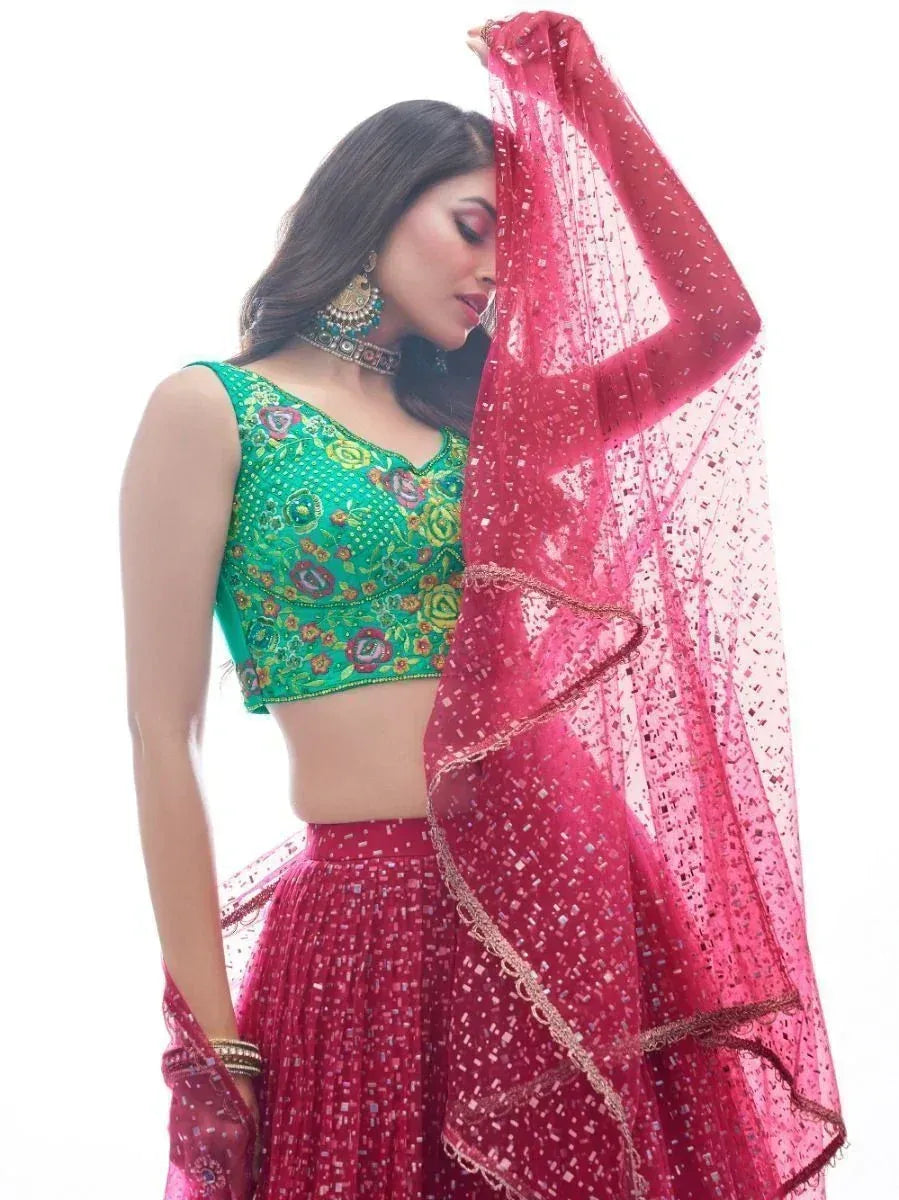 Green embroidered blouse with pink lehenga and dupatta, Indian ethnic wear for women