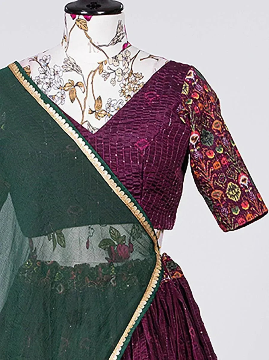 Green and maroon ethnic saree with floral blouse, perfect for Indian occasions and festive wear.