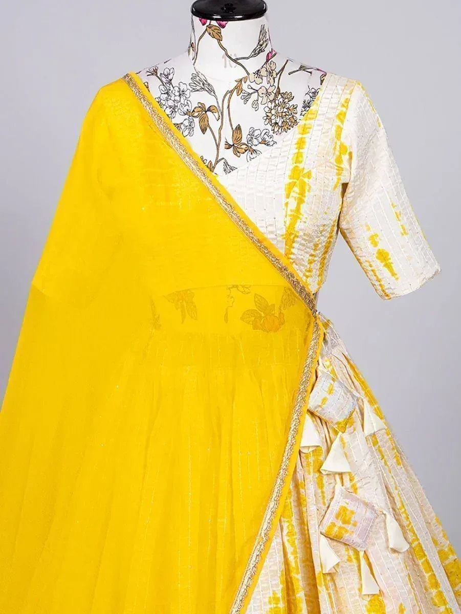 Yellow and white tie-dye lehenga choli with floral blouse and dupatta, Indian ethnic wear