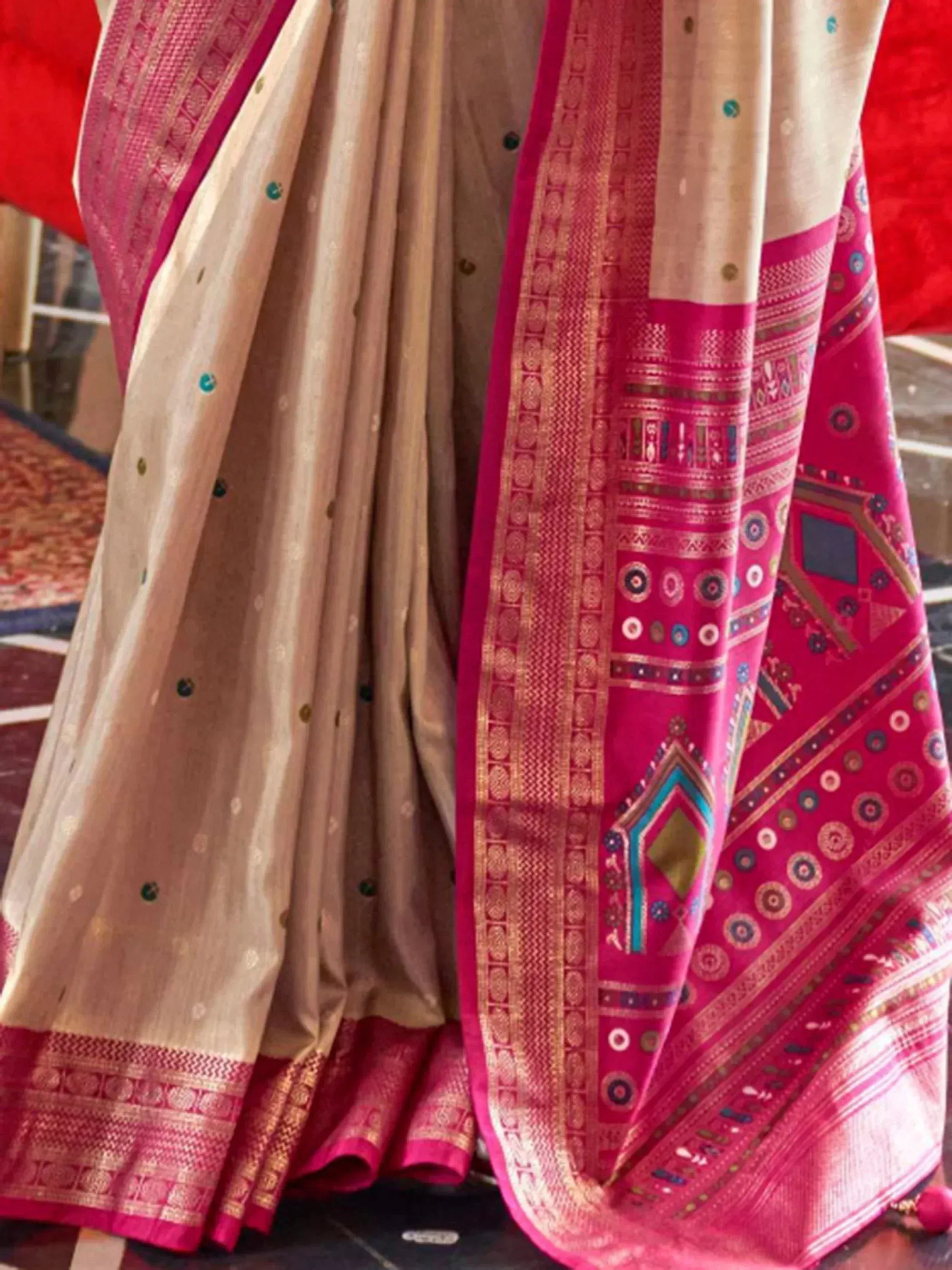 Cream and pink ethnic saree with intricate geometric border and woven motifs, perfect for Indian occasions