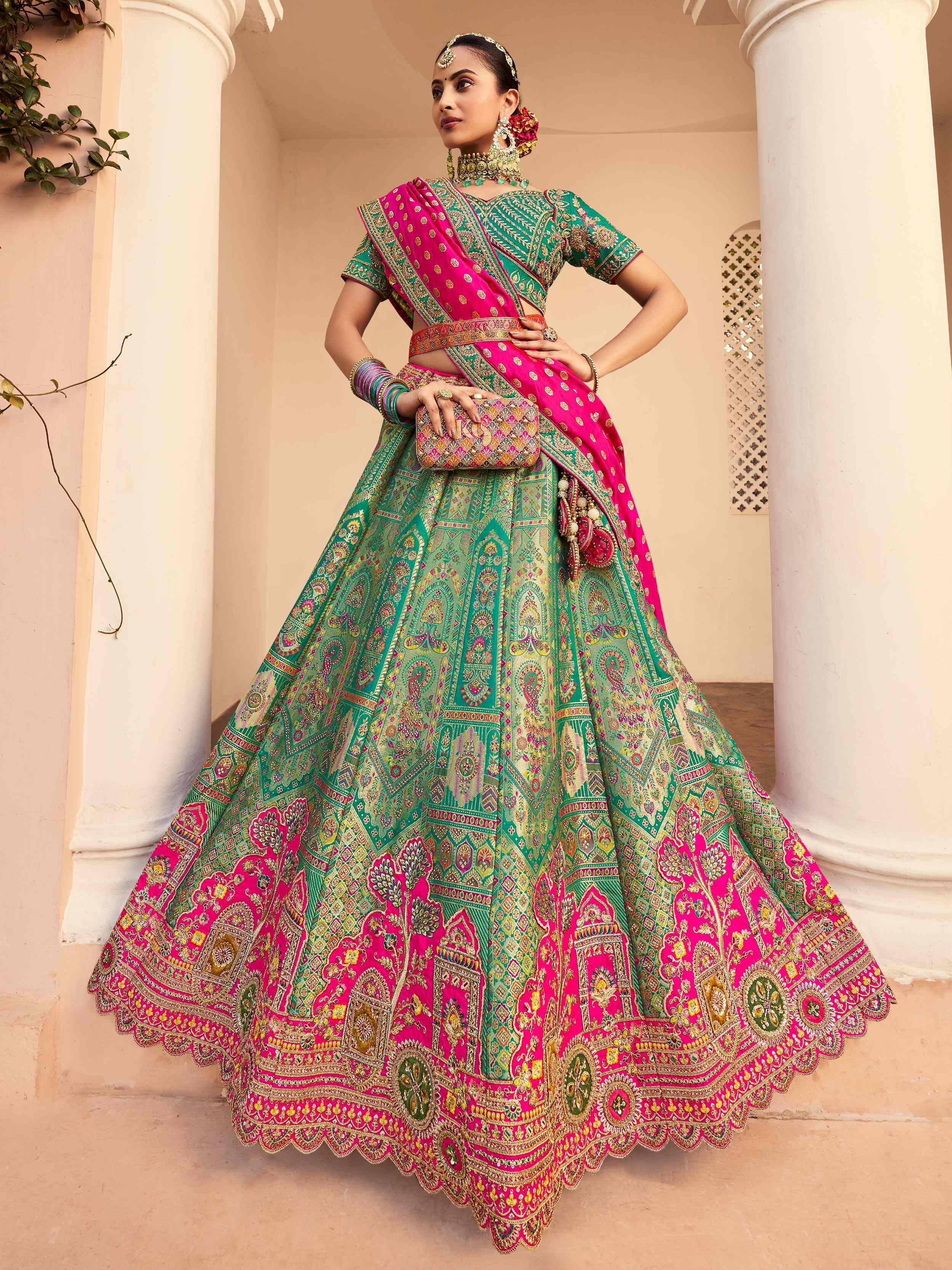 Green and pink embroidered lehenga choli with dupatta, traditional Indian ethnic wear for weddings and festivals