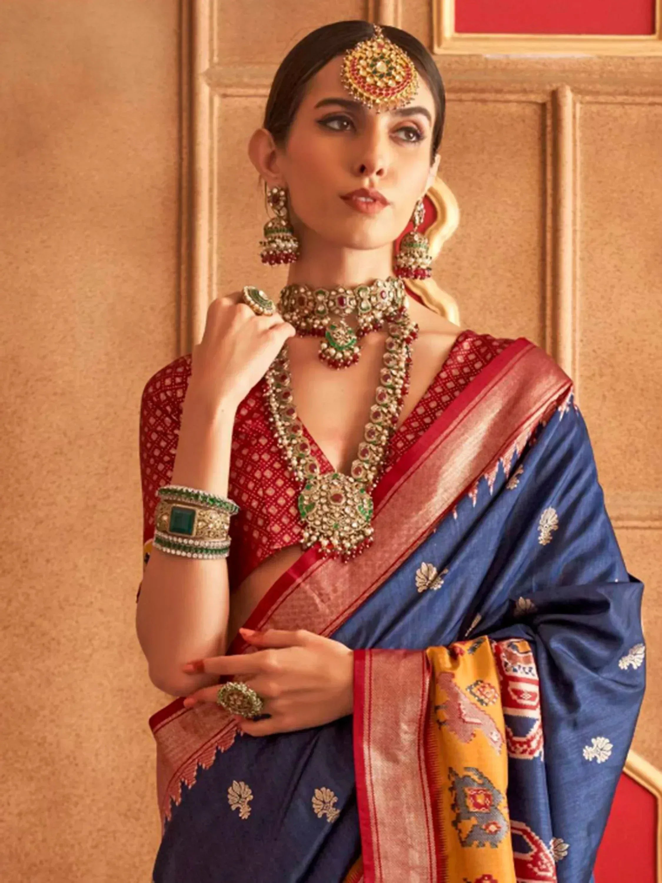 Dazzling Navy Blue Patola Printed Silk Function Wear Saree With Blouse