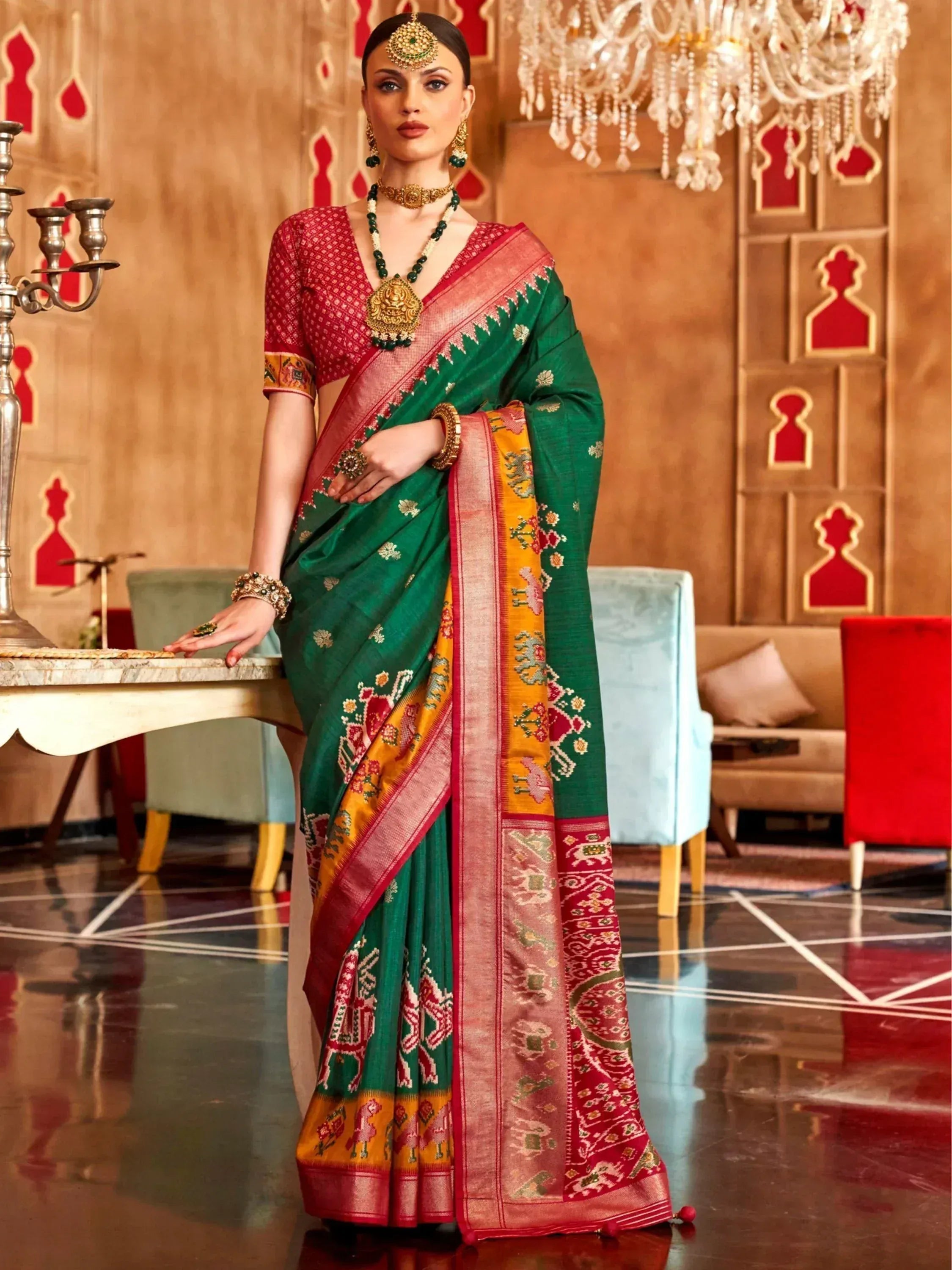 Green and red designer saree with gold embroidery, perfect for Indian ethnic wear and festive occasions