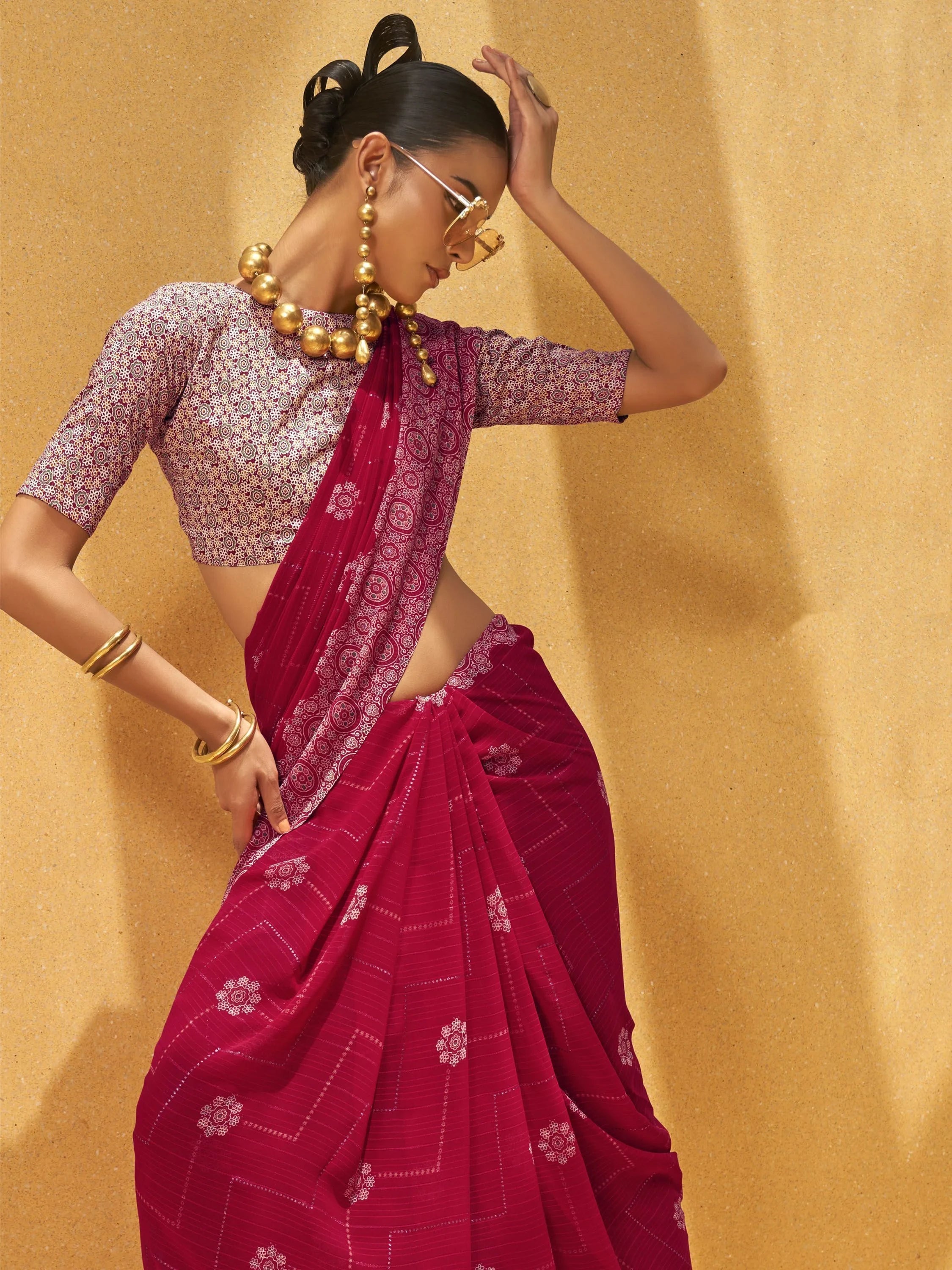 Attractive Pink Foil Print Georgette Casual Wear Saree With Blouse