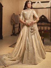 Fascinating Beige Embroidered Silk Wedding Wear Lehenga Choli