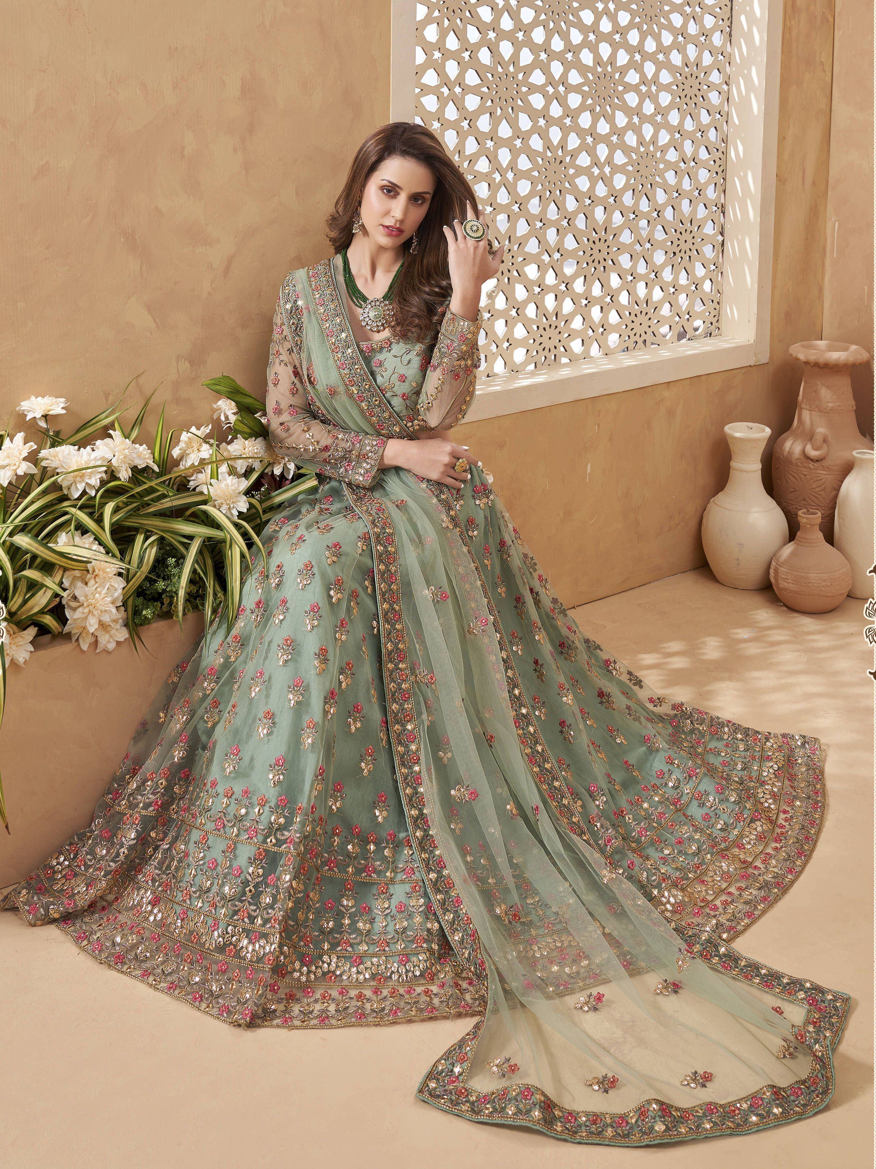 Elegant sage green embroidered lehenga choli with floral motifs, perfect for Indian ethnic occasions