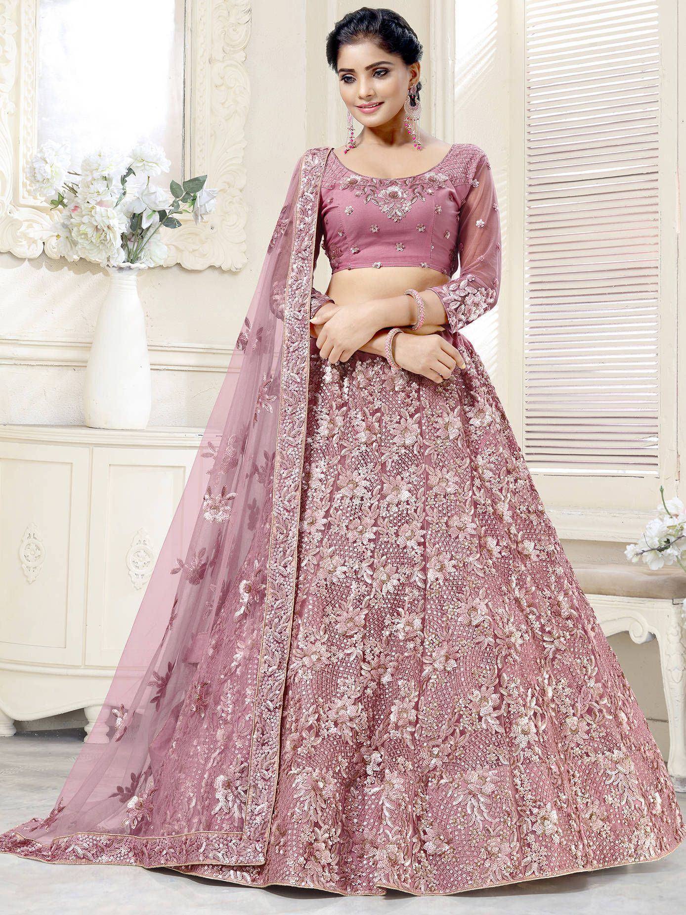 Pink embroidered lehenga choli with floral work, perfect for weddings and festive occasions