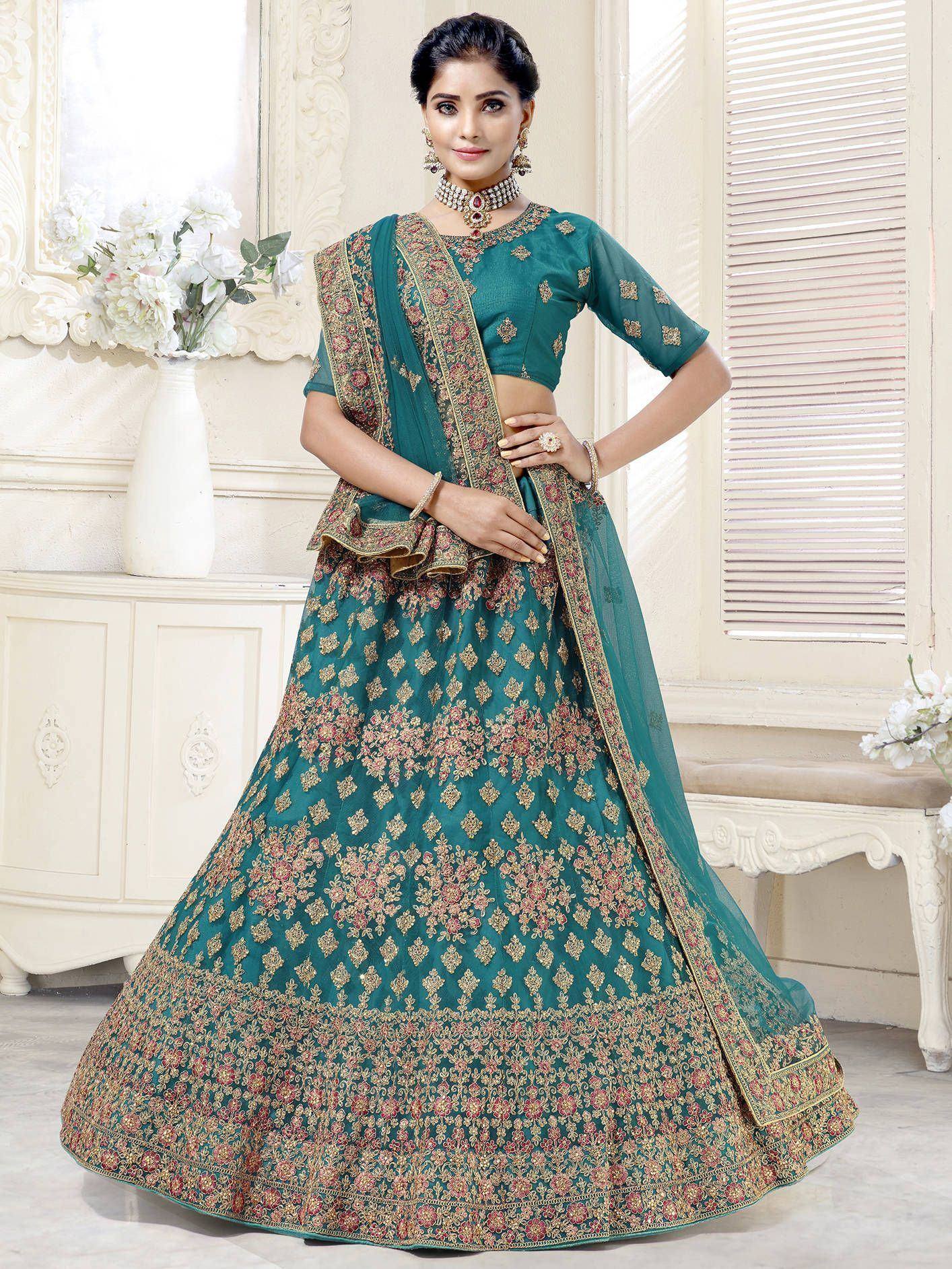 Teal embroidered lehenga choli with floral gold detailing, perfect for Indian ethnic occasions