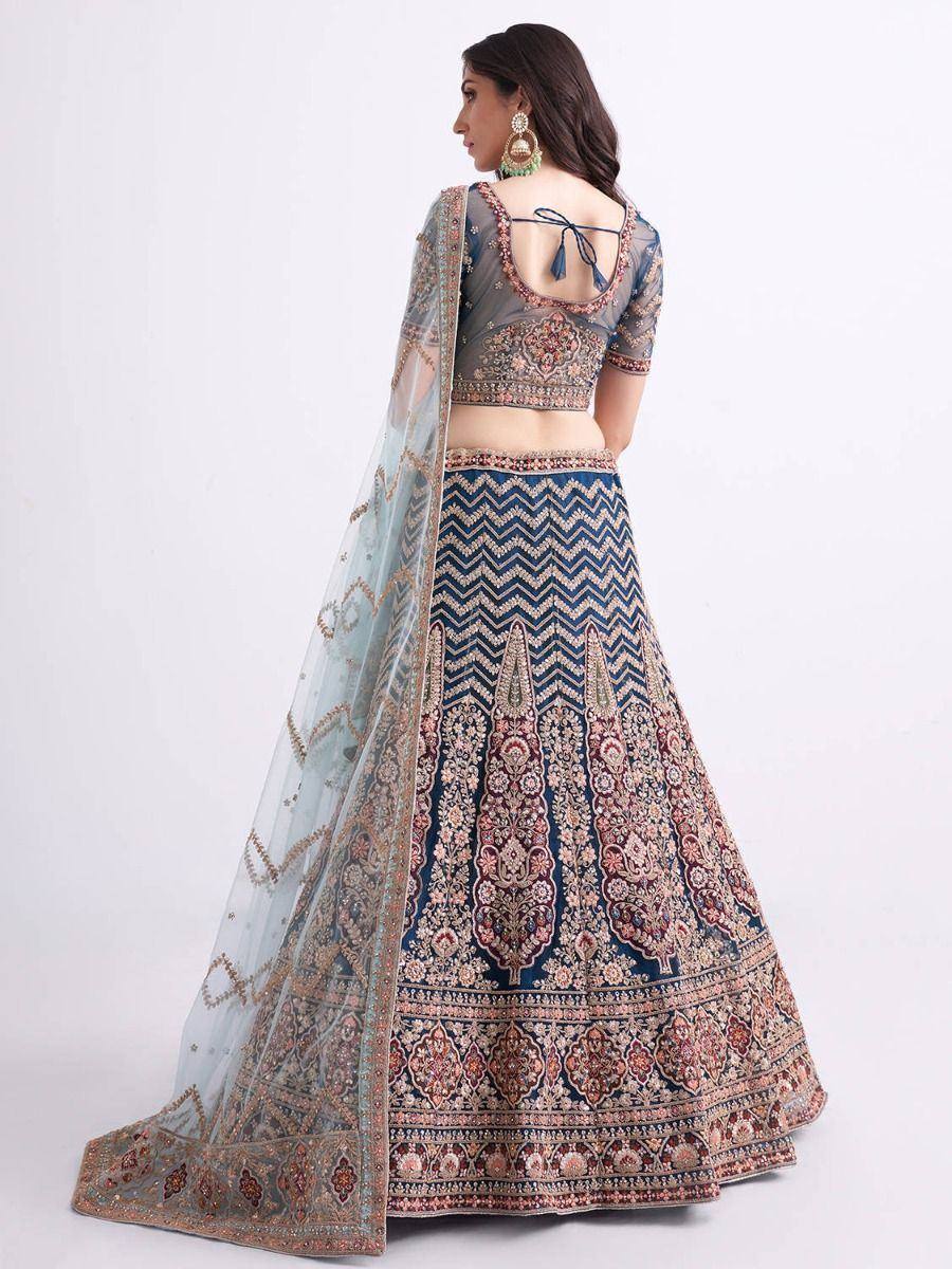 Blue and pink embroidered lehenga choli with sheer dupatta, back view