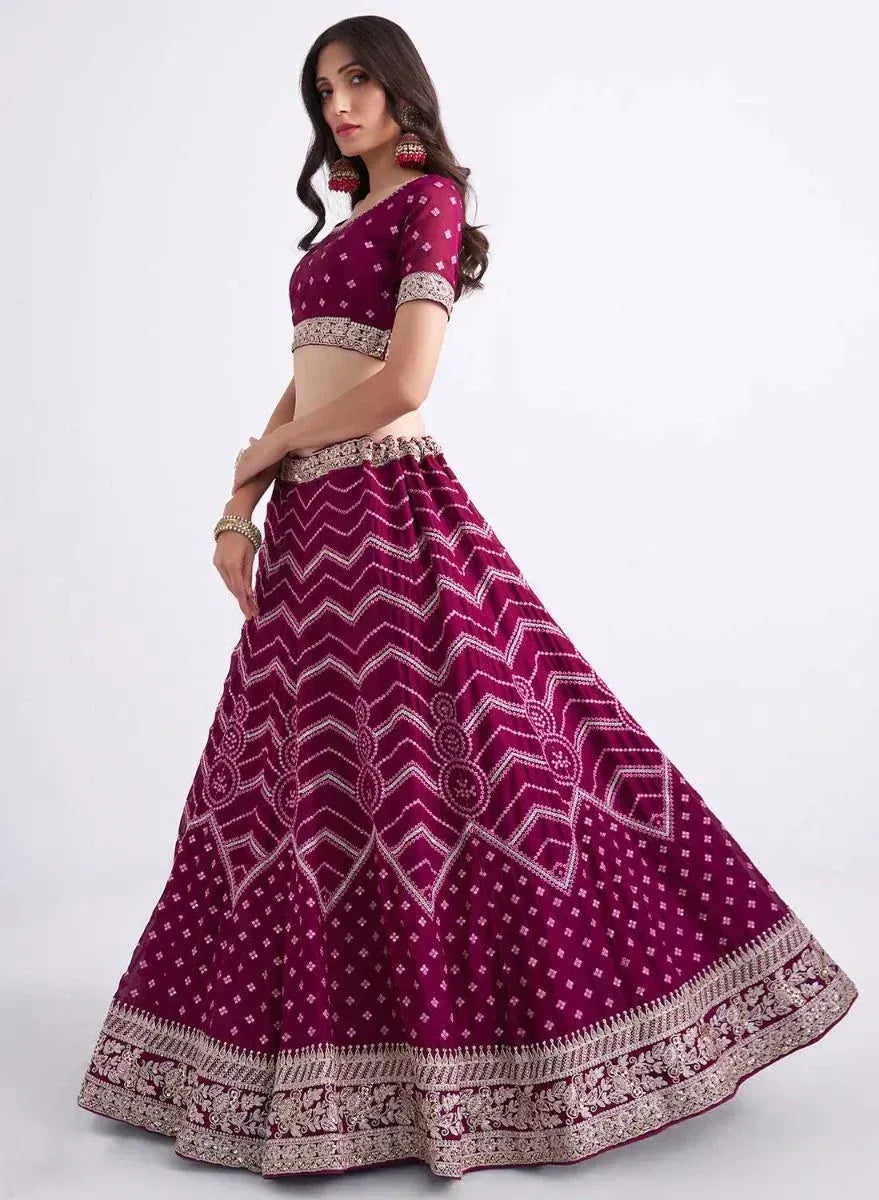 Maroon lehenga choli with white geometric print and gold embroidery, Indian ethnic wear