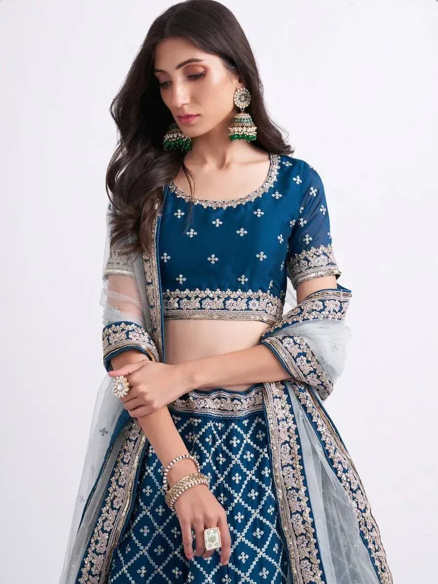 Blue embroidered lehenga choli with sheer dupatta, perfect for Indian ethnic wear occasions