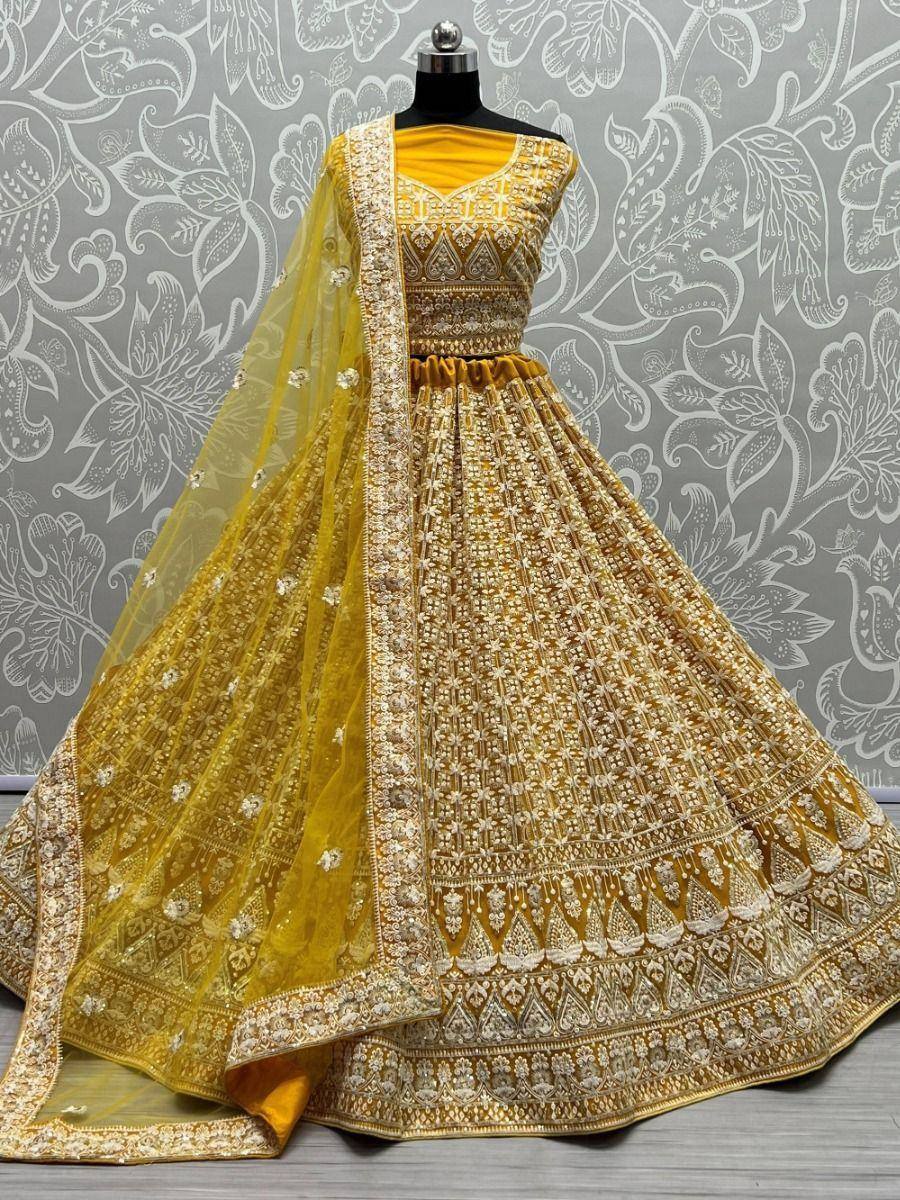 Yellow embroidered lehenga choli with dupatta, designer Indian ethnic wear for weddings and festivals