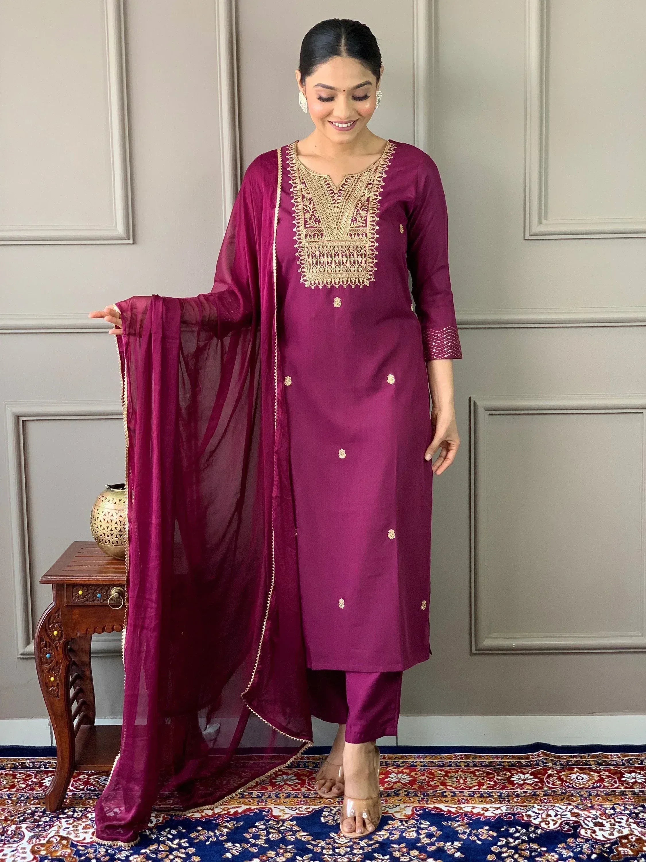 Elegant maroon salwar kameez with gold embroidery, perfect for Indian ethnic wear occasions