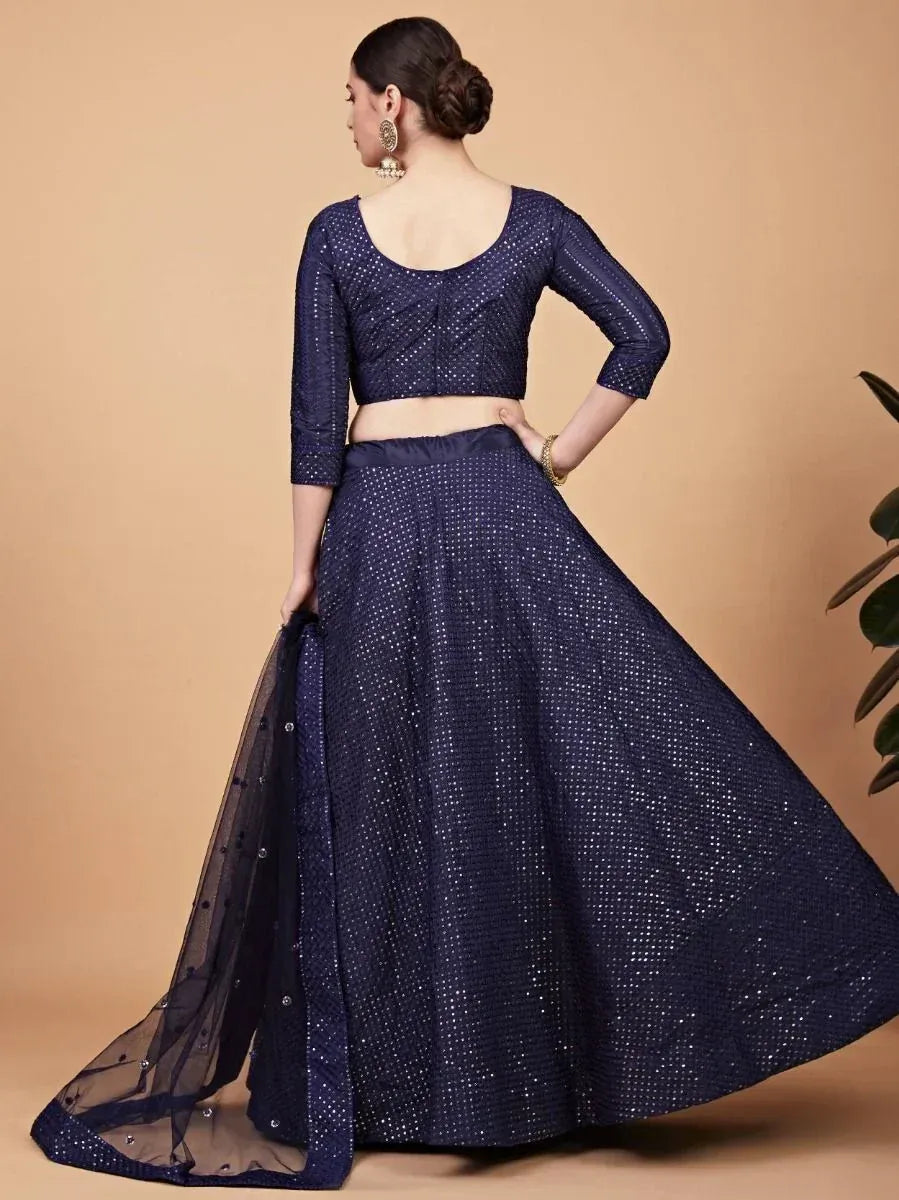 Navy blue designer lehenga choli with sequin work and sheer dupatta, perfect for Indian ethnic wear occasions