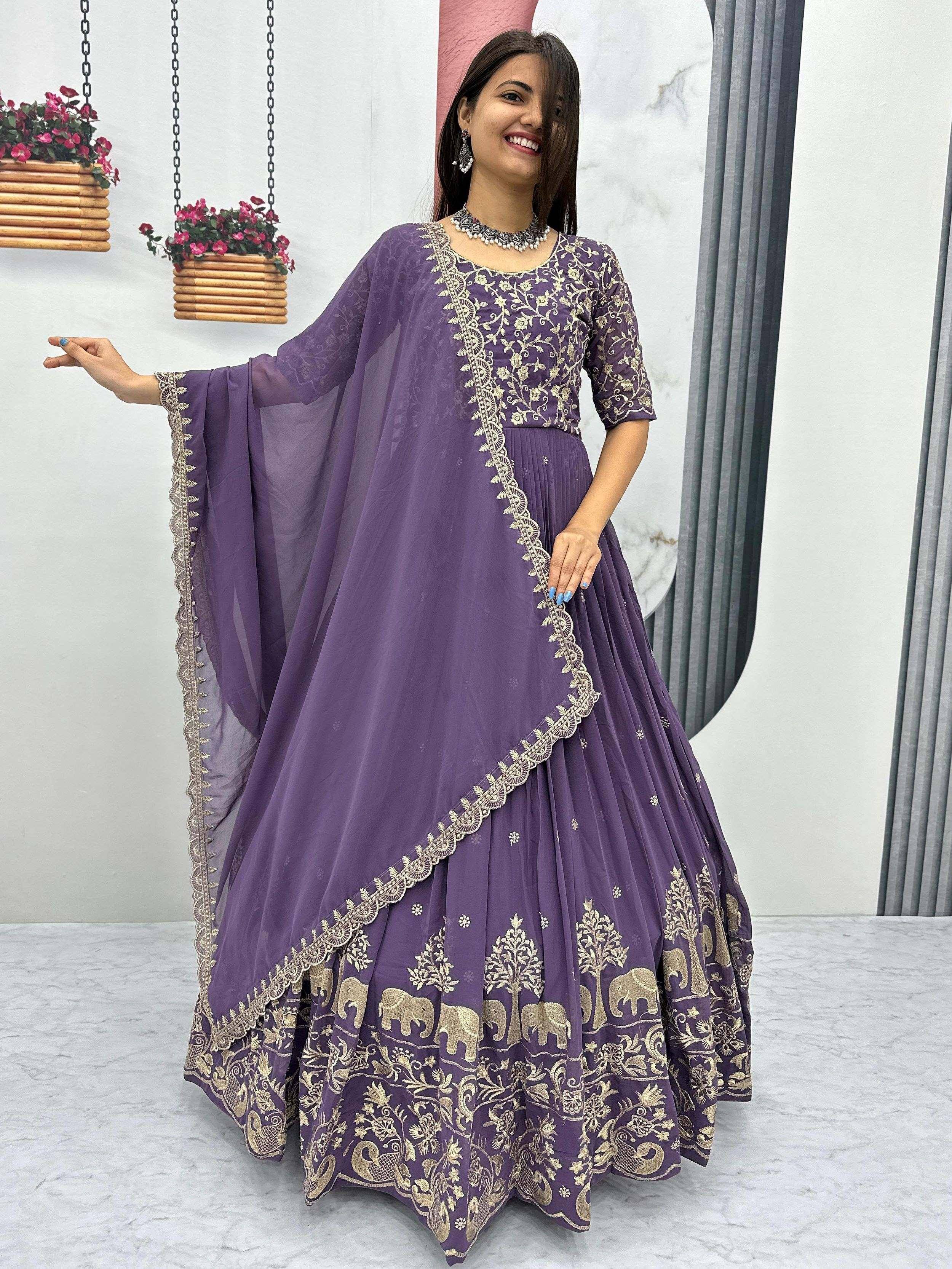 Purple embroidered lehenga choli with gold elephant and floral motifs, perfect for Indian ethnic wear