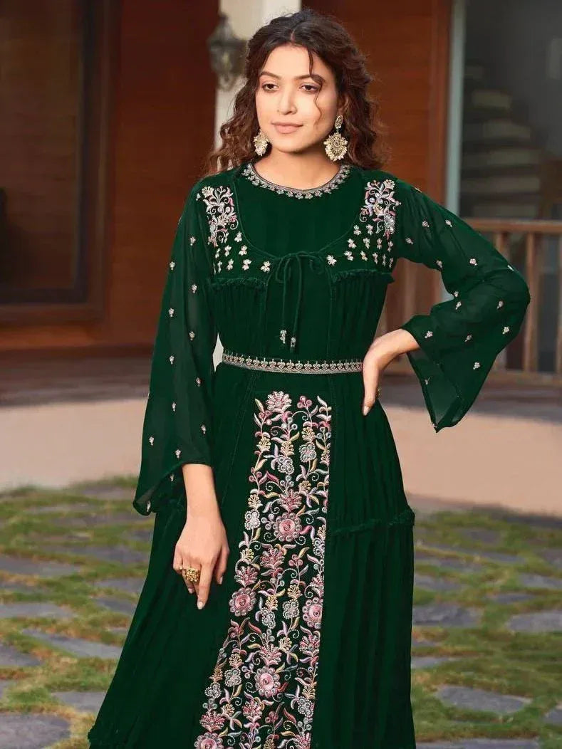 Emerald green embroidered ethnic gown with floral detailing, perfect for Indian occasions