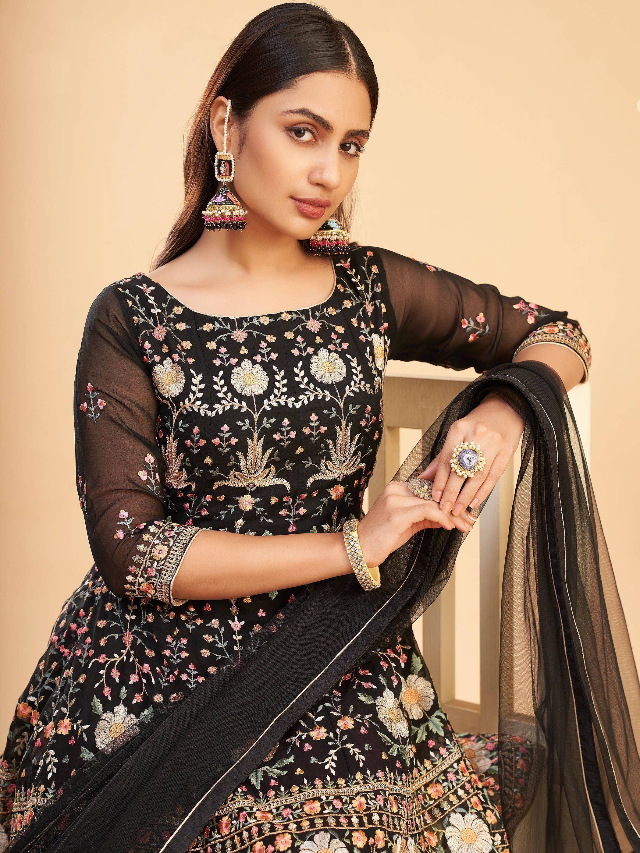 Black floral embroidered anarkali suit with sheer sleeves and dupatta, perfect for Indian ethnic occasions.