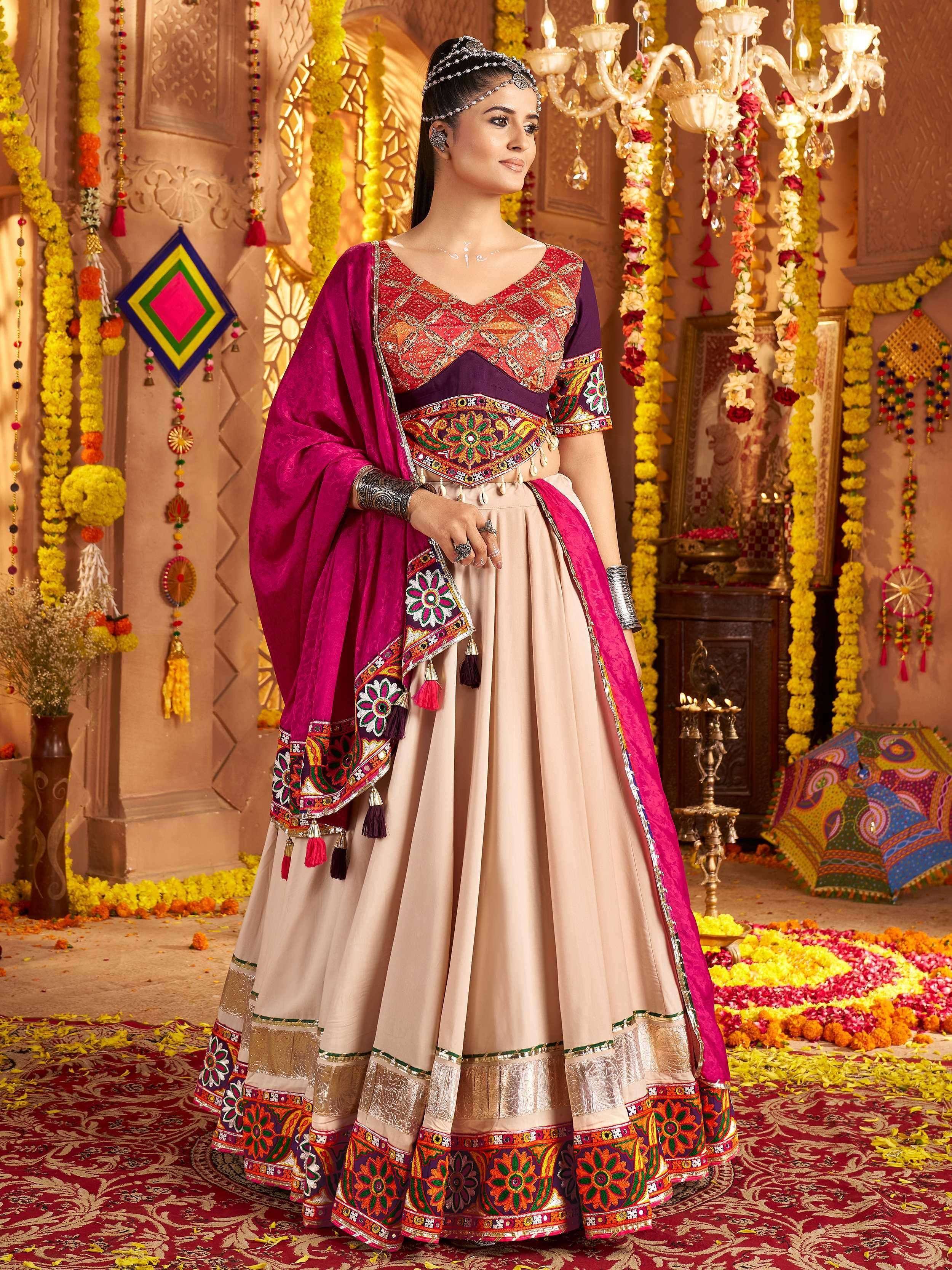 Woman in vibrant Indian ethnic lehenga choli with intricate embroidery, floral garlands, and festive decor