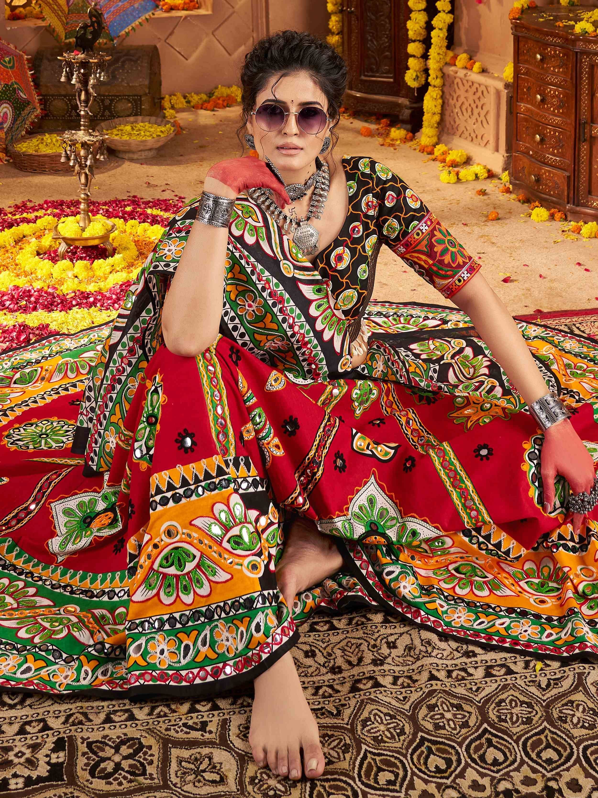 Vibrant Indian ethnic wear with mirror work, floral patterns, and traditional jewelry for festive occasions