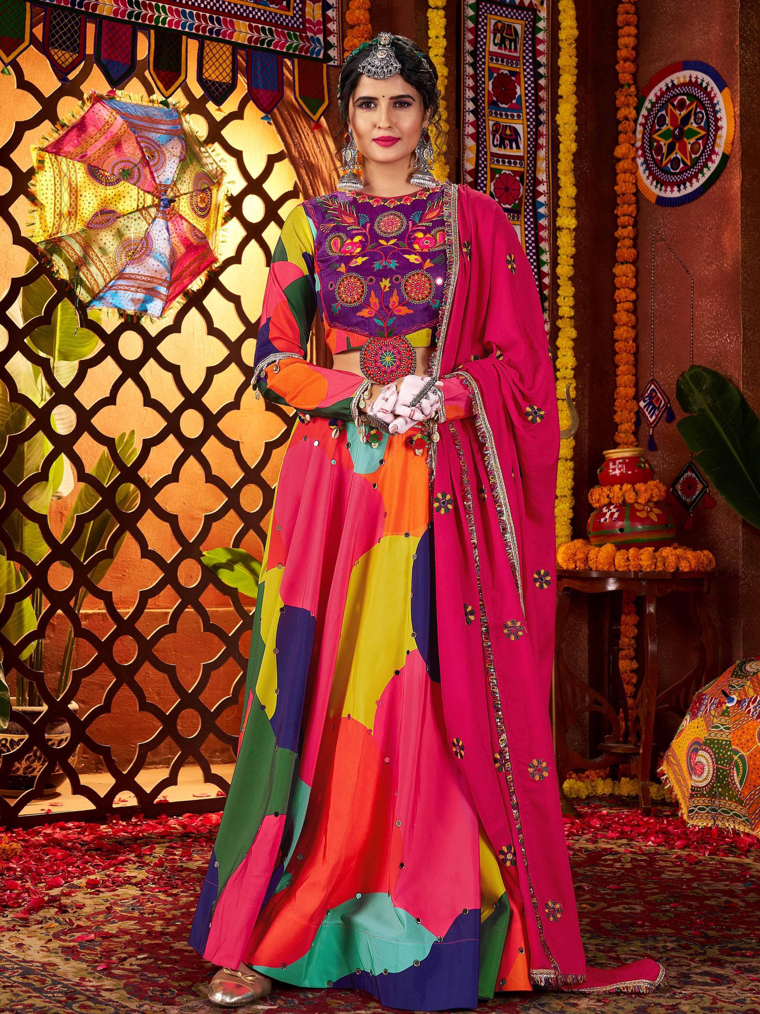 Vibrant multicolor embroidered lehenga choli with pink dupatta, perfect for Indian ethnic wear occasions