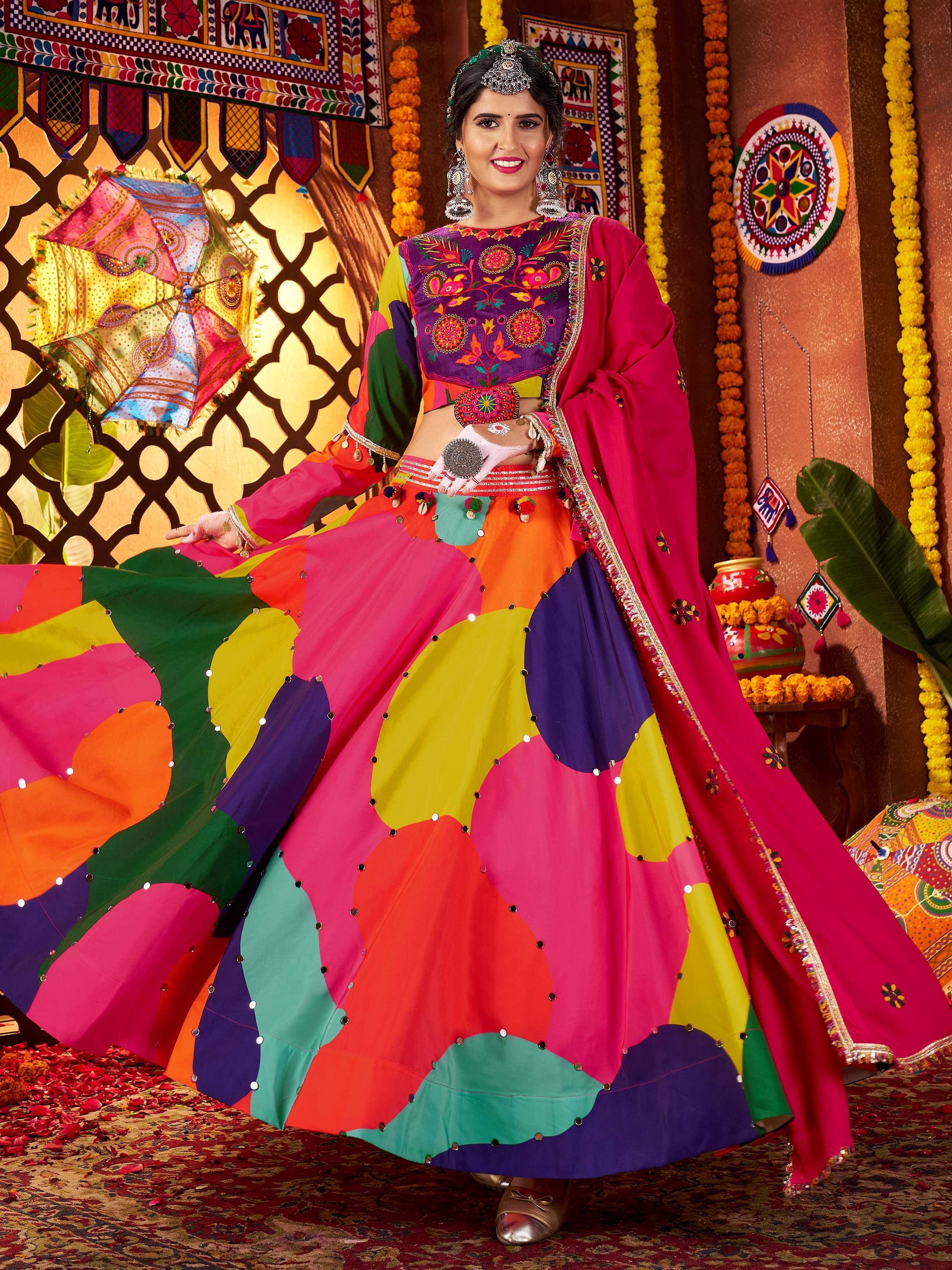 Vibrant multicolor embroidered lehenga choli with mirror work, perfect for Indian ethnic celebrations and festivals.