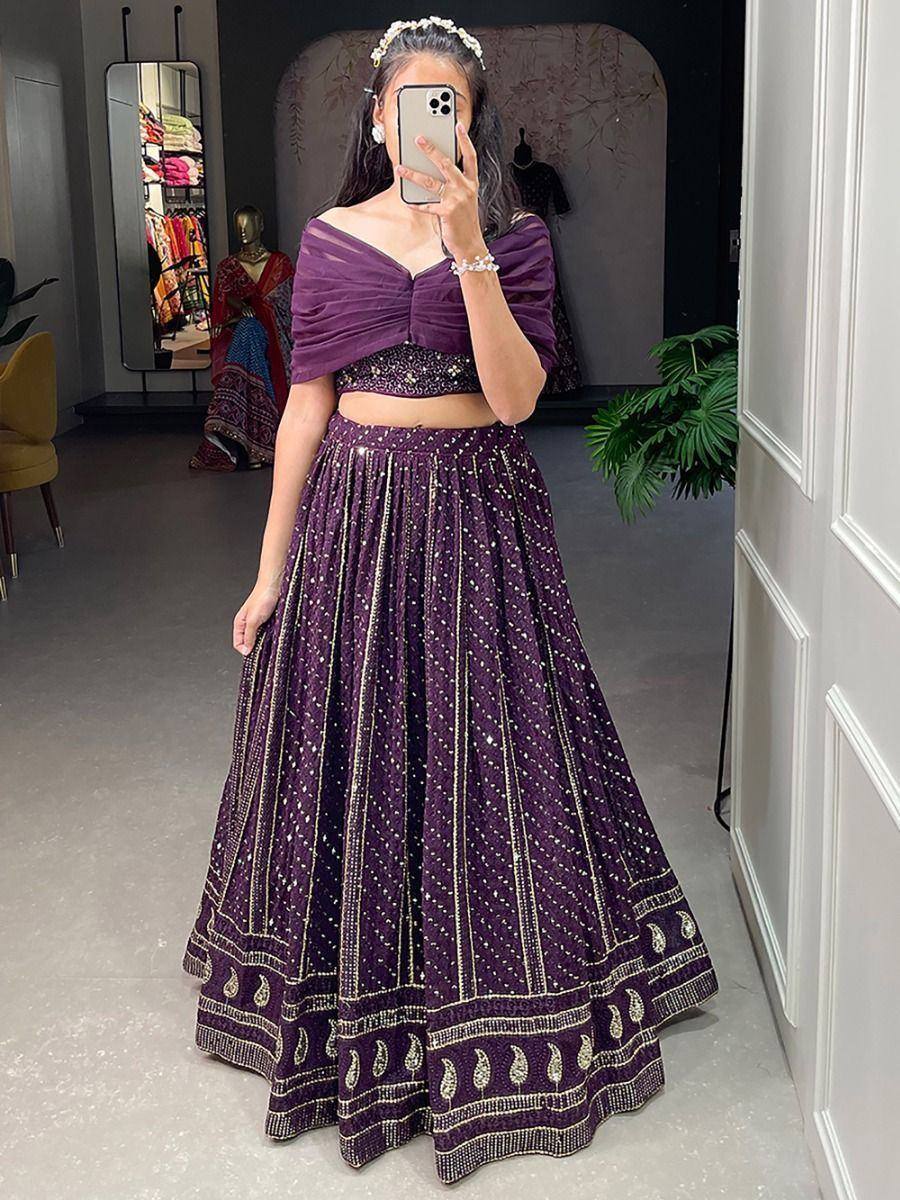 Purple designer lehenga choli with gold embroidery, perfect for Indian ethnic wear occasions