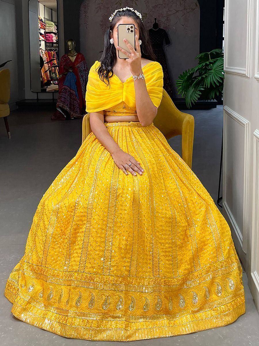 Vibrant yellow designer lehenga choli with sequin work, perfect for Indian ethnic occasions