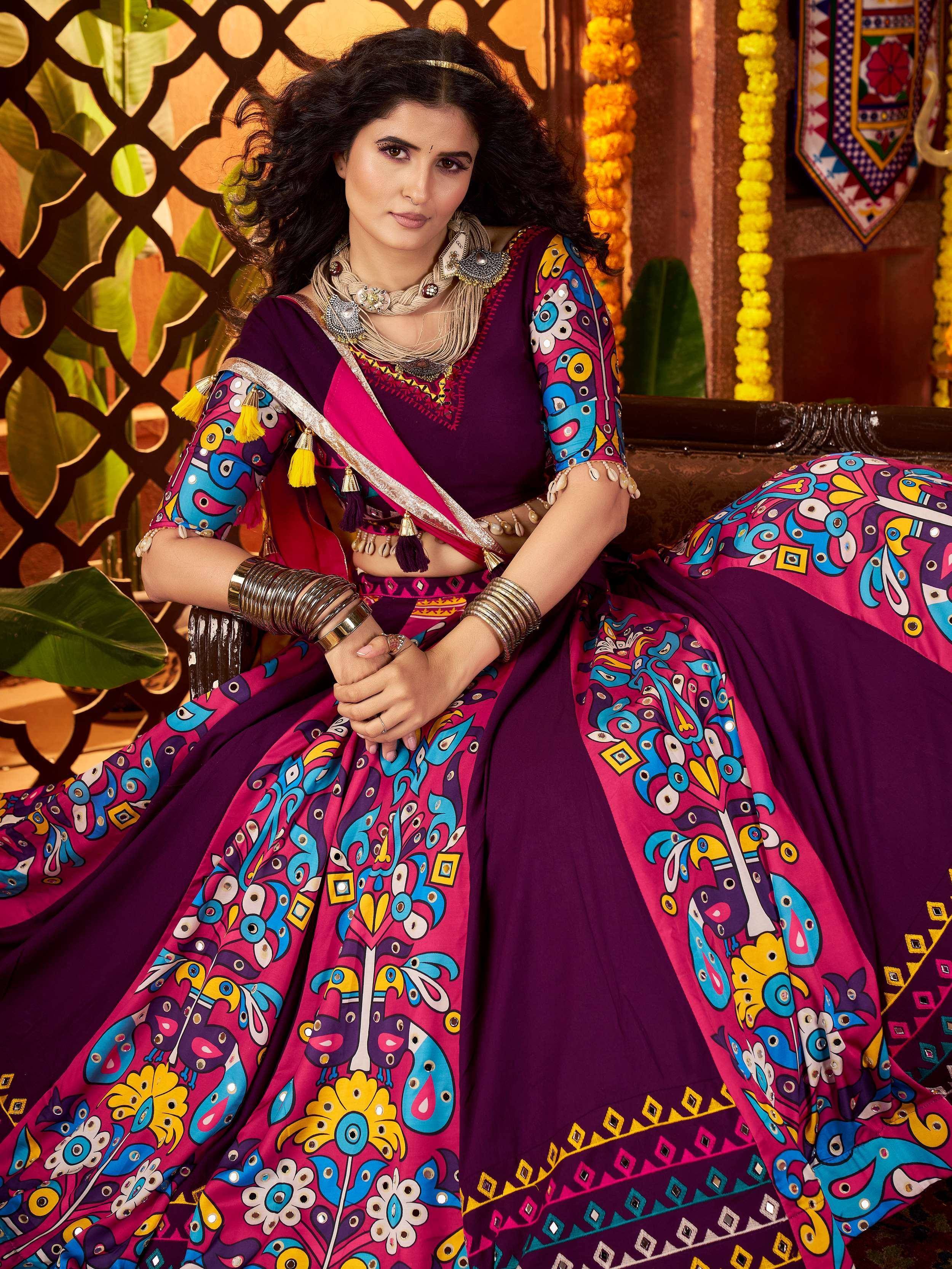 Vibrant purple and pink printed lehenga choli with bird motifs, perfect for Indian ethnic wear occasions